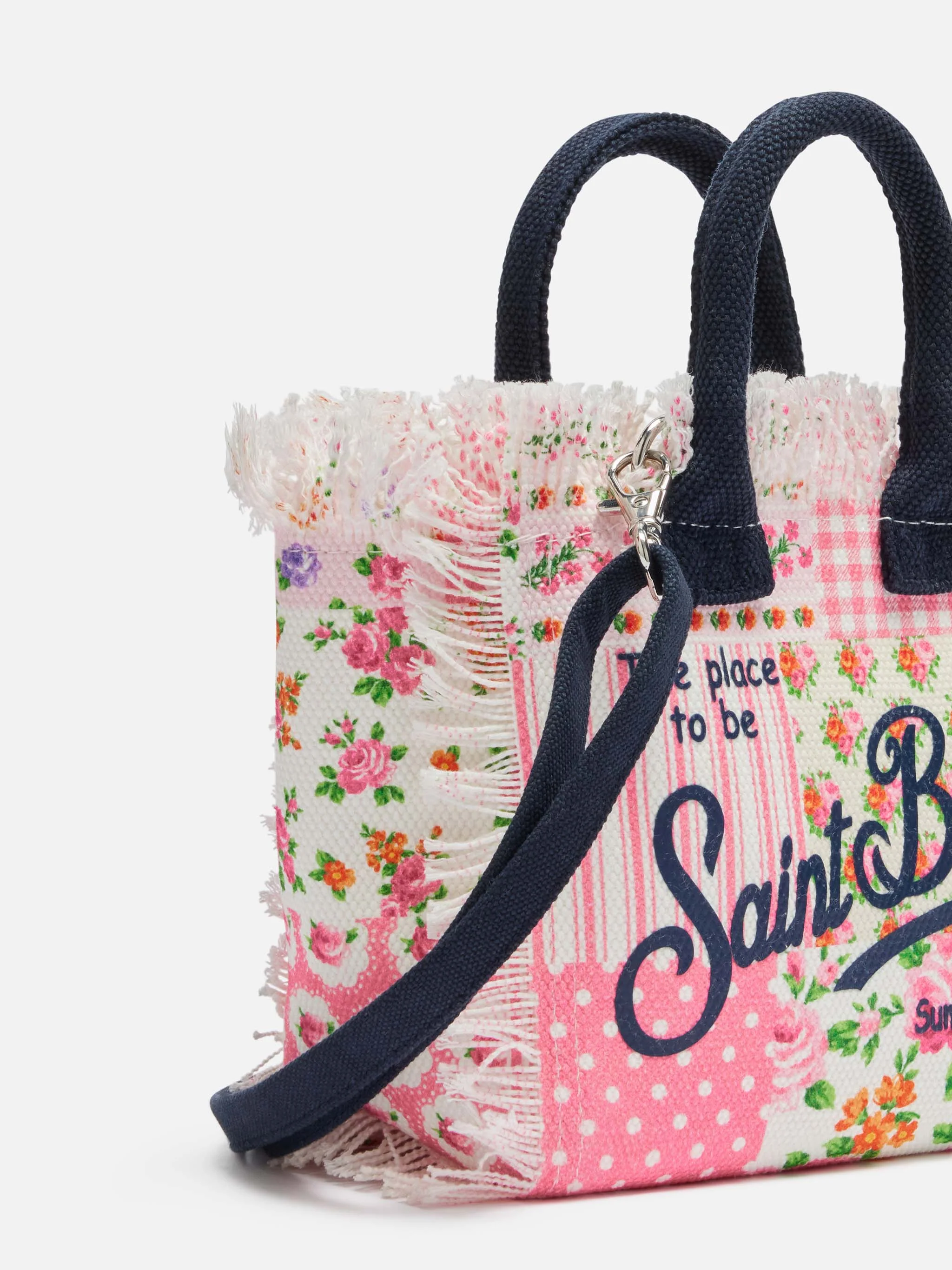 Mini necessaire em lona de algodão com estampa floral.