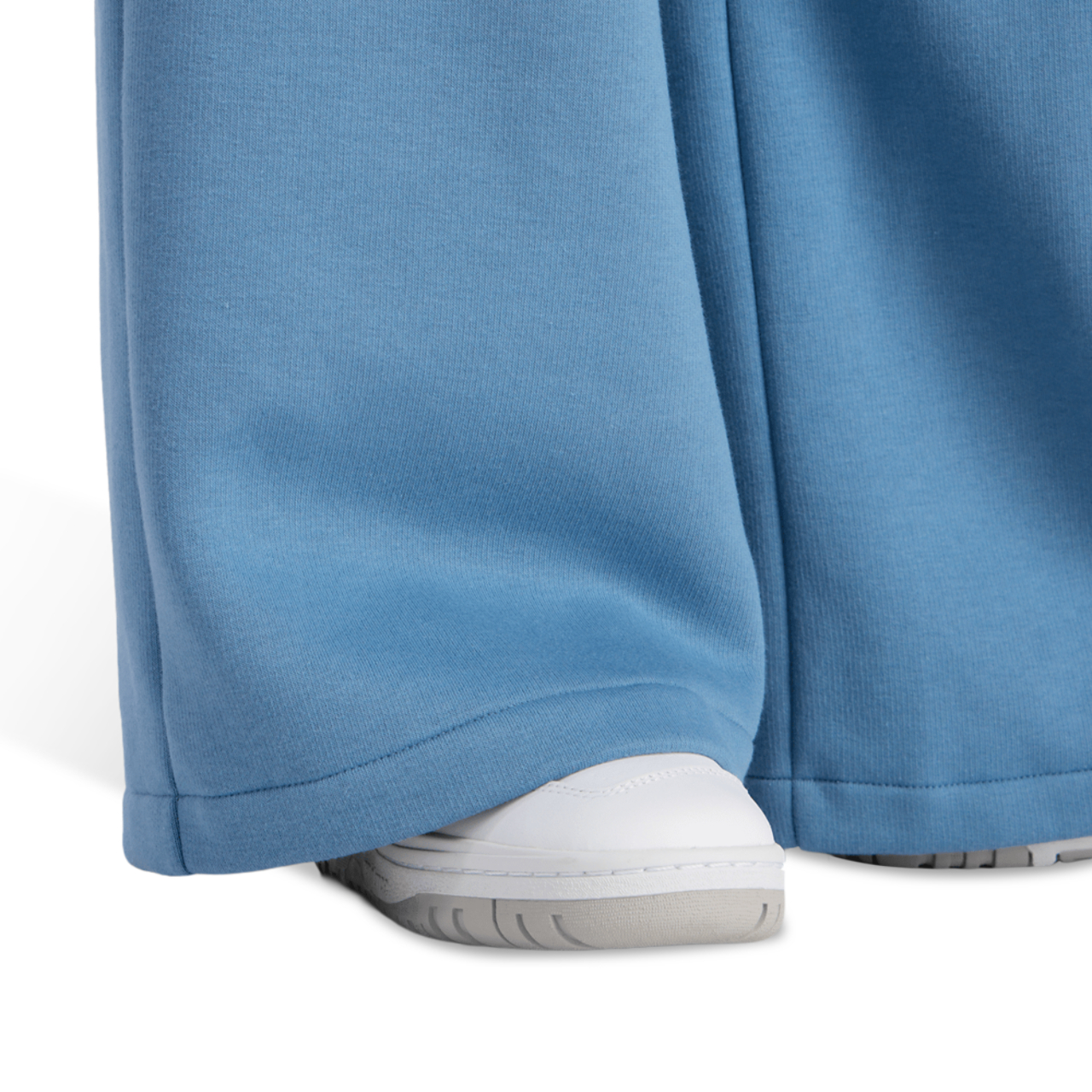 New Balance Linear Heritage Fleece -leveälahkeiset housut