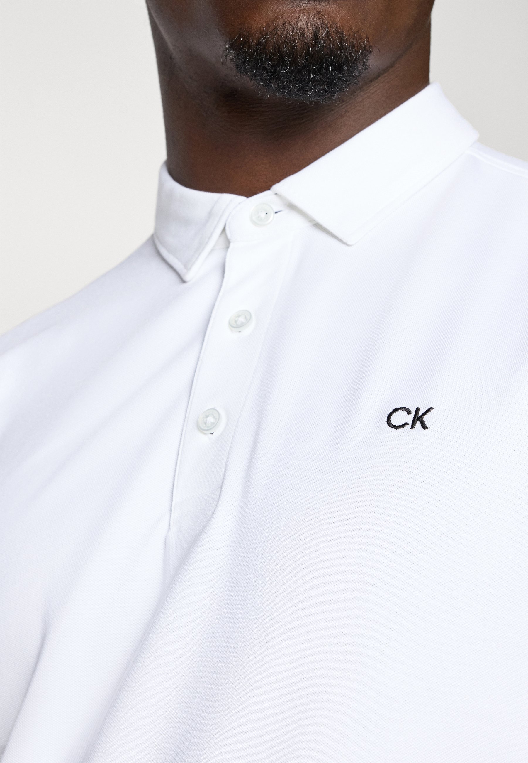 Polo de golf Calvin Klein - blanc