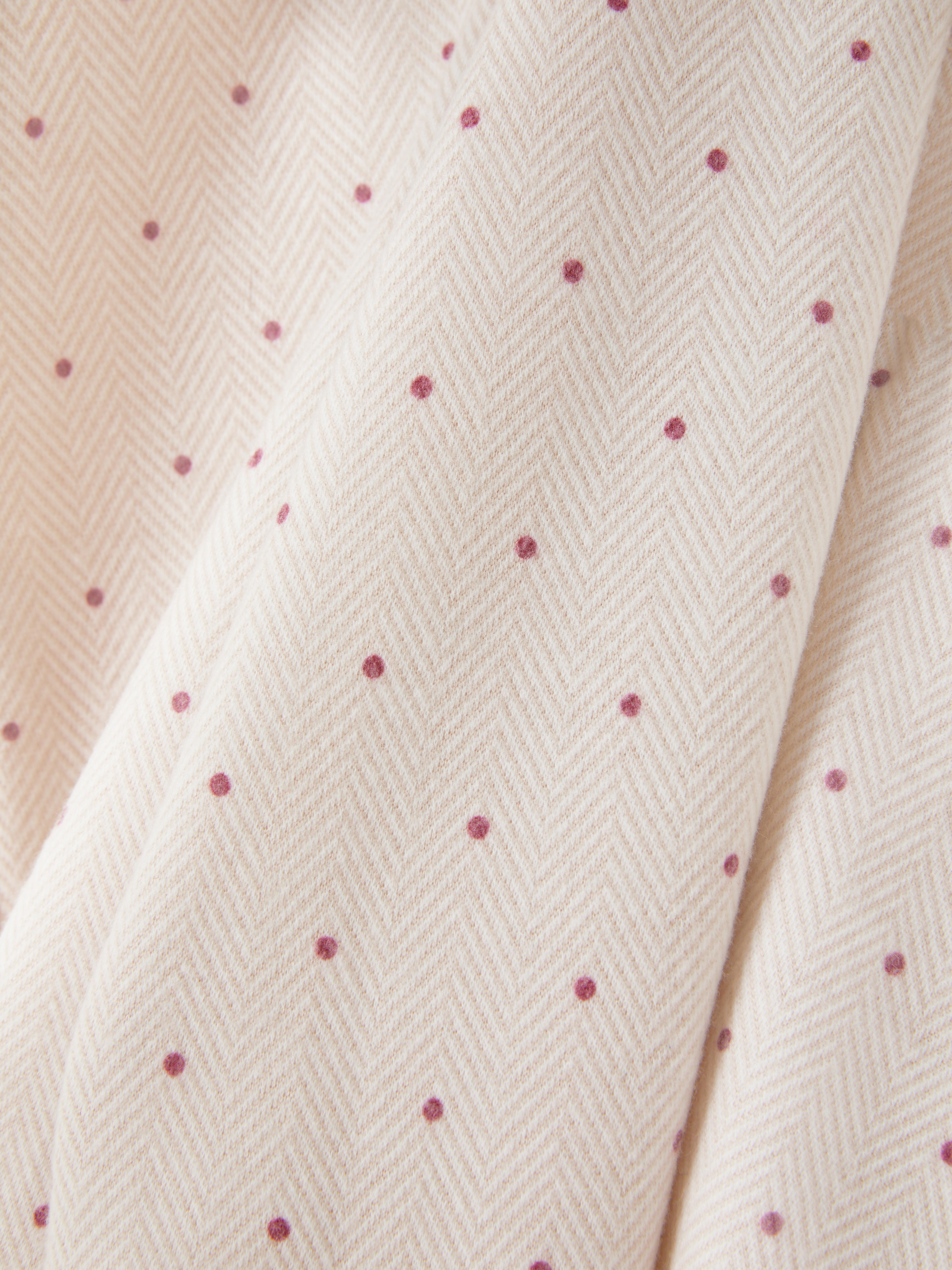 Összeillő fodros felső és leggings Egy hozzáillő szett fodros felsővel és rugalmas leggings-szel