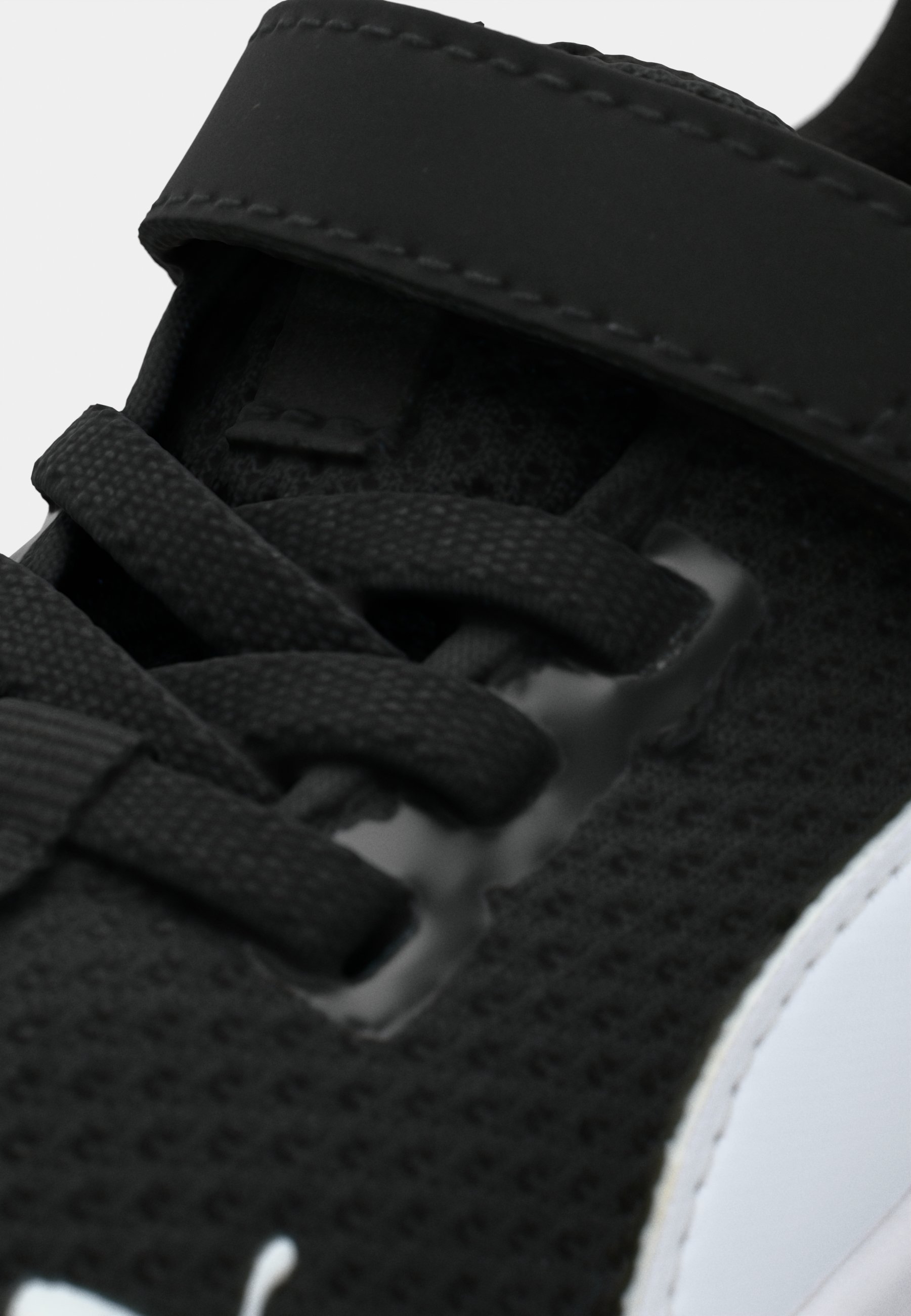 Puma ANZARUN LITE UNISEXE - Chaussures de course sur route - noir/blanc