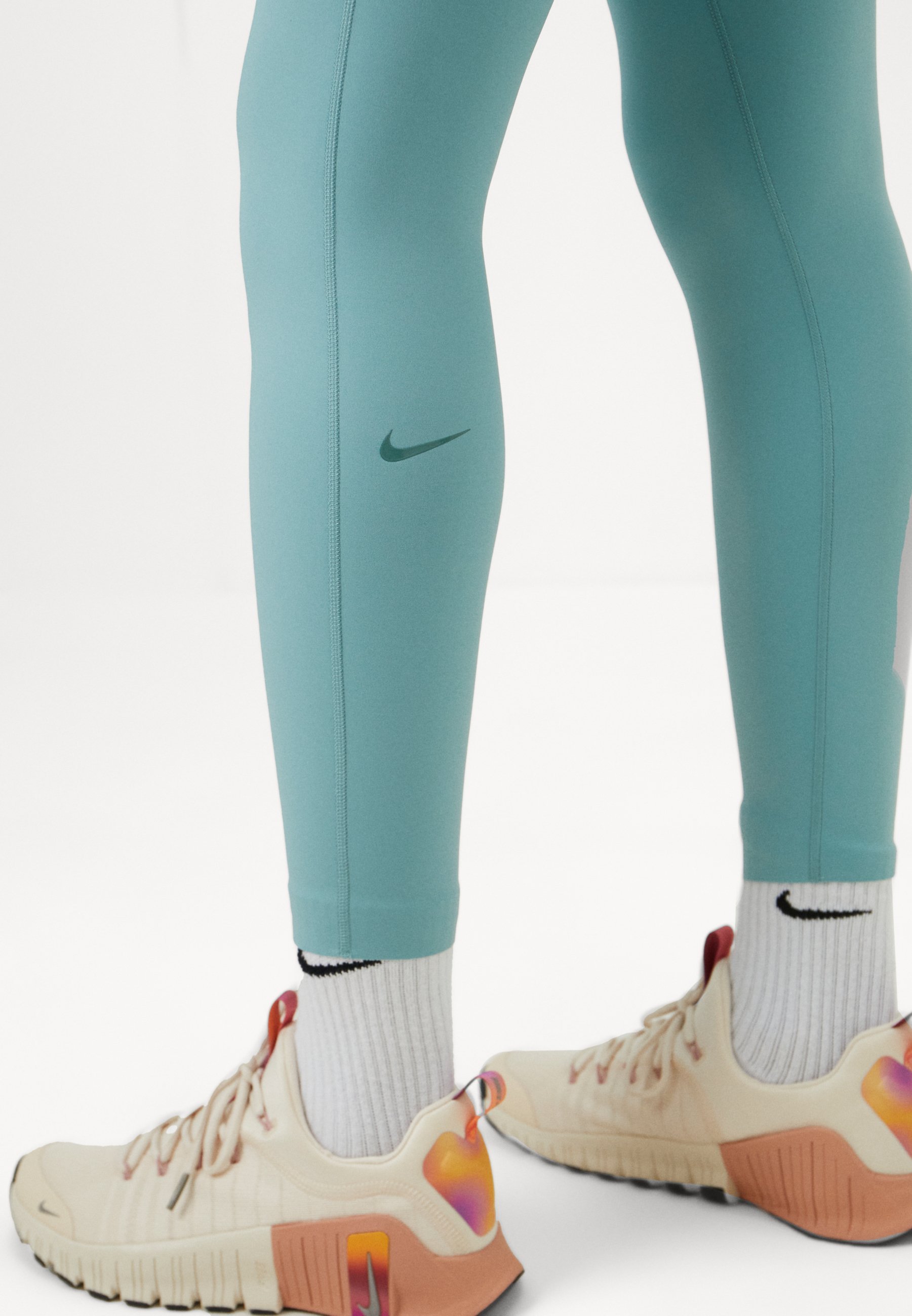 Legging Nike Performance UNIVERSA SEAMLESS FRONT 7/8 - Cannon/Bicoastal
