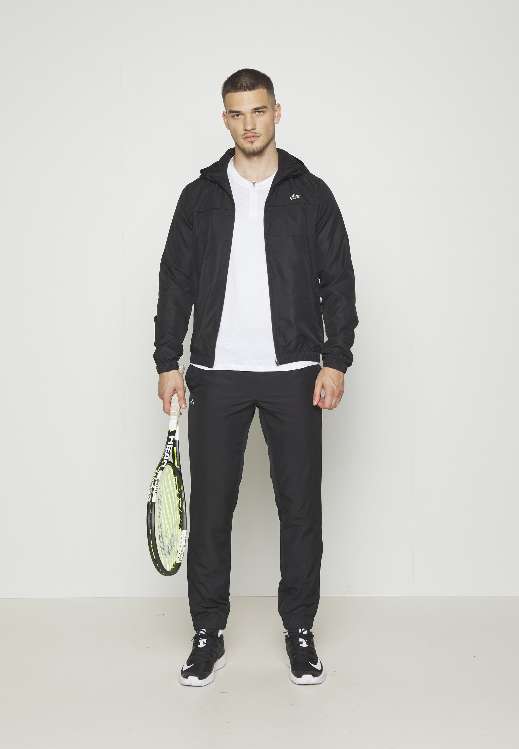 Tuta sportiva Lacoste con cappuccio - nera