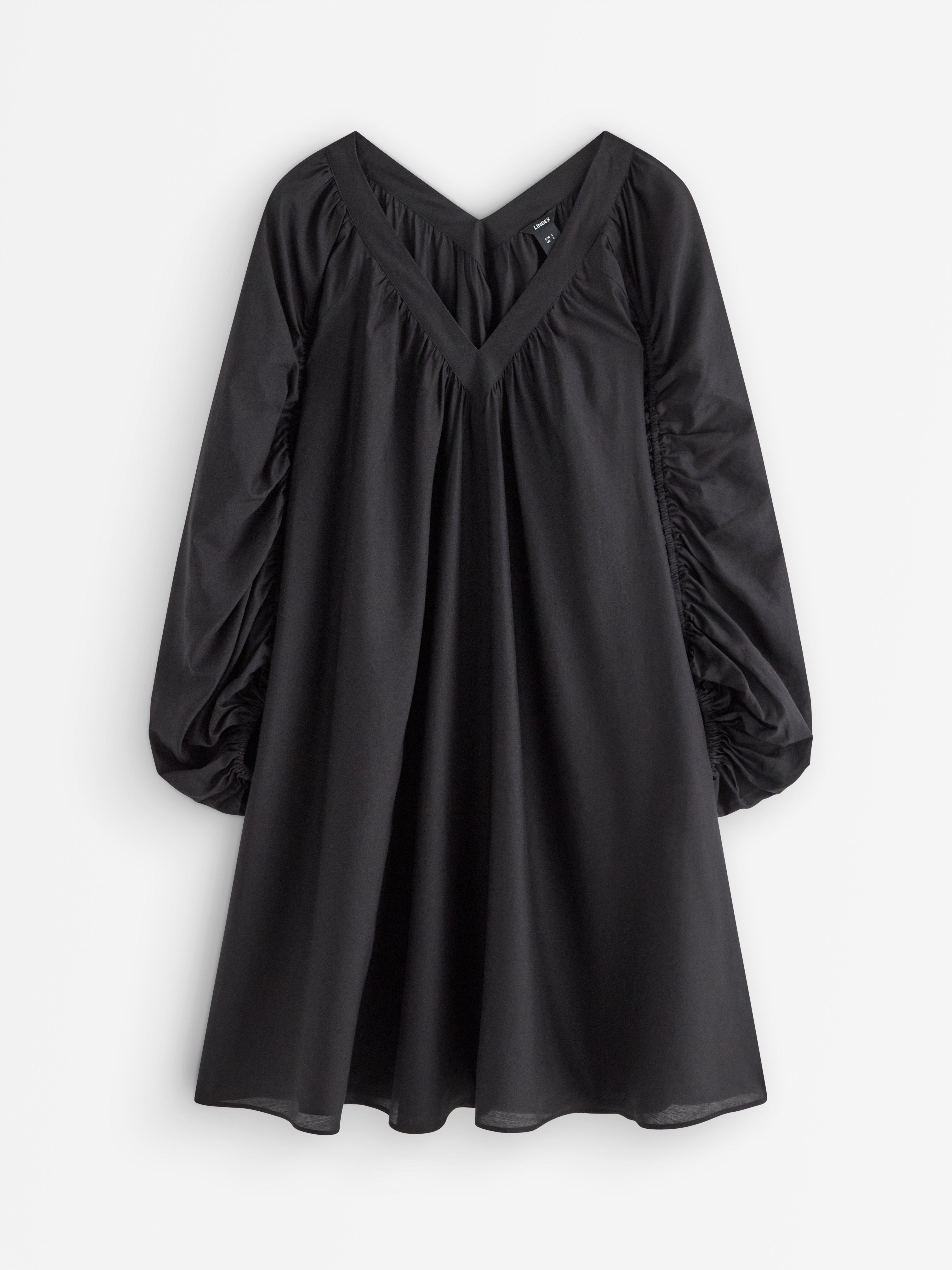 Minivestido con mangas abullonadas negro