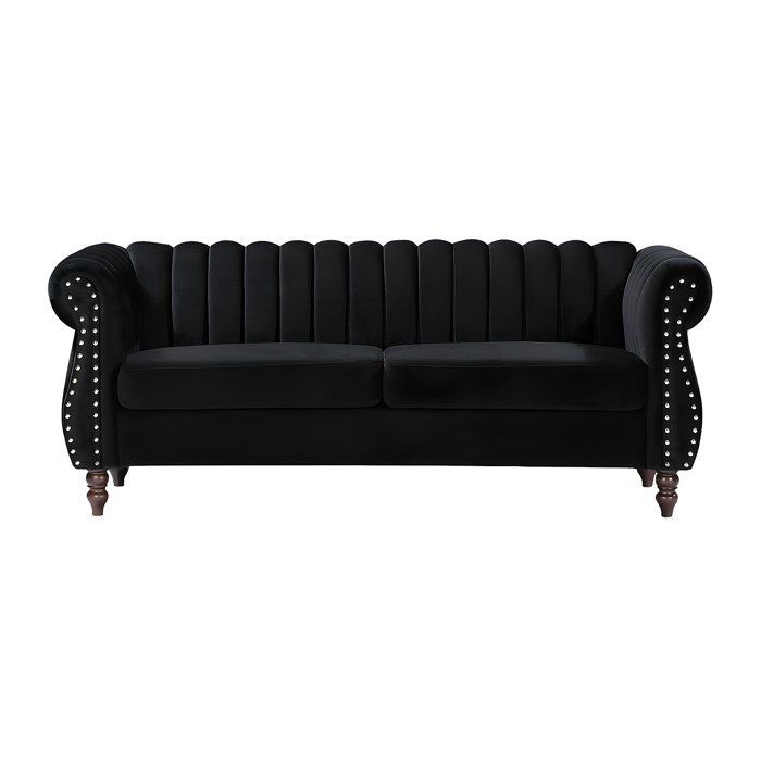 Sofá Chesterfield de 3 plazas TRUMBO en terciopelo negro.