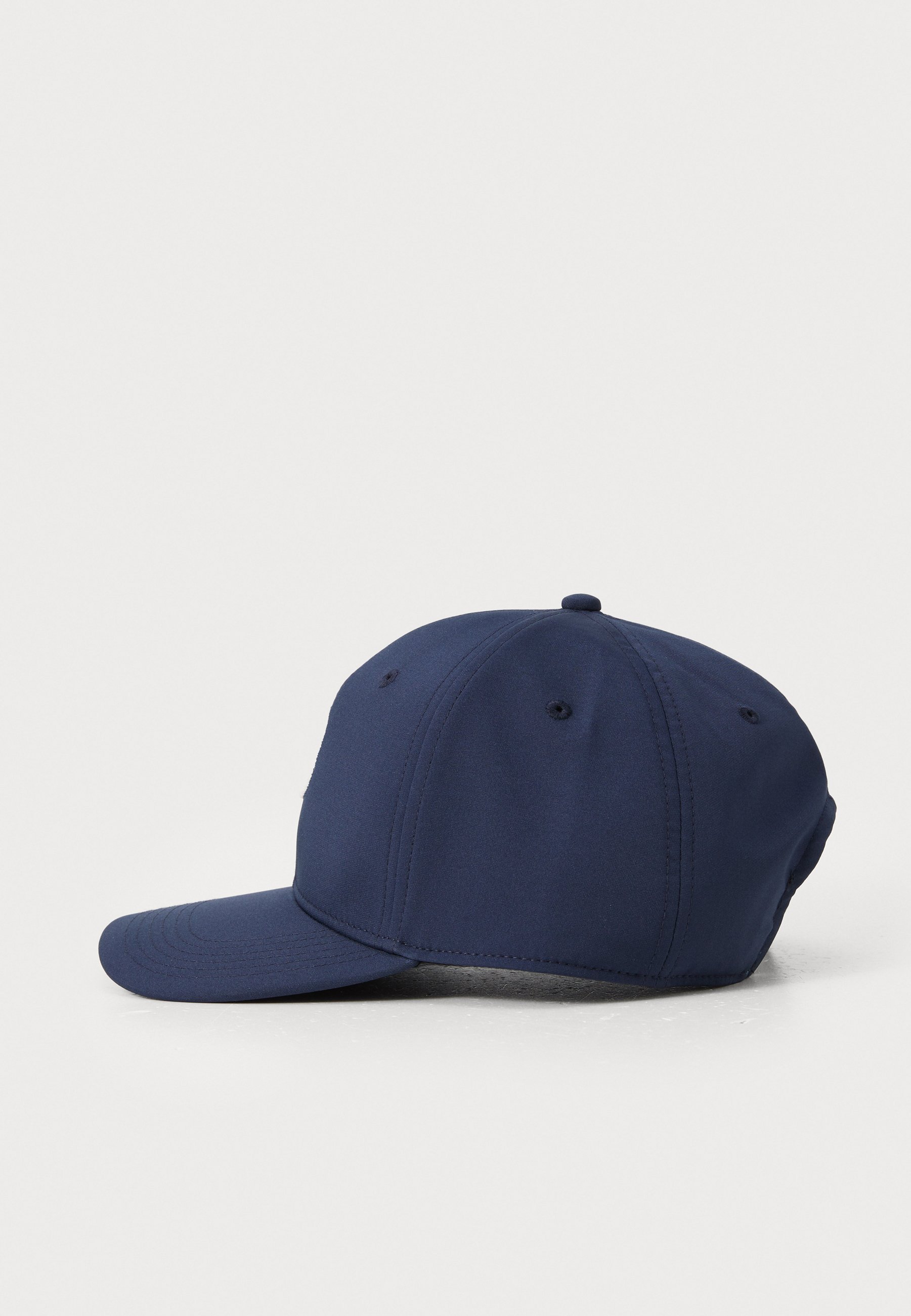 Puma Golf HERITAGE P TECH CAP - Nokamüts - tumesinine