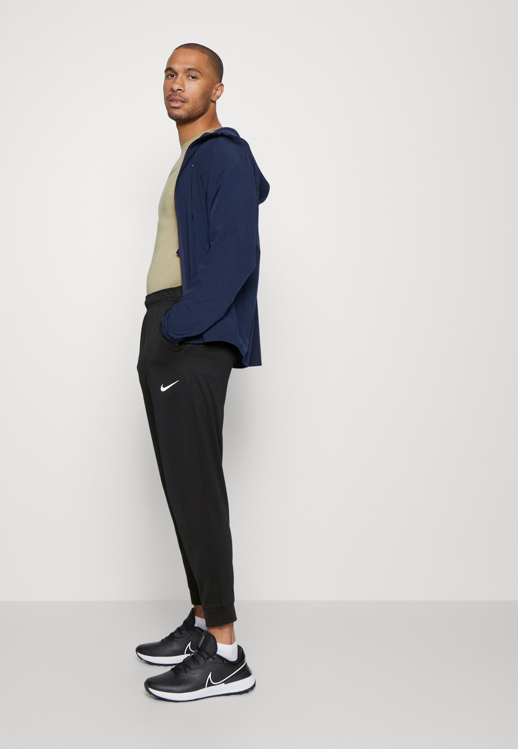 Pantaloni da tuta Nike Performance TOTALITY - nero/bianco