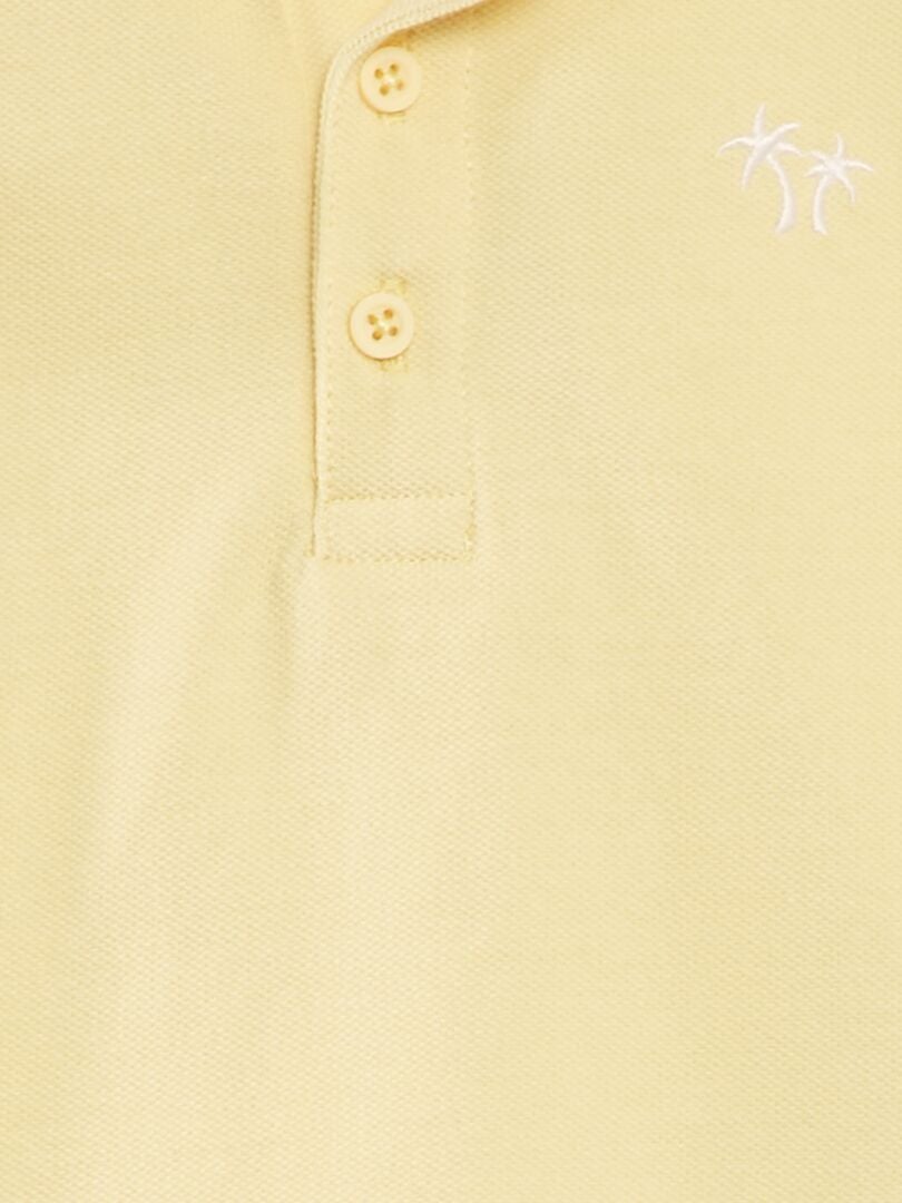 Camisa polo de algodão piqué com estampa de palmeiras - AMARELA