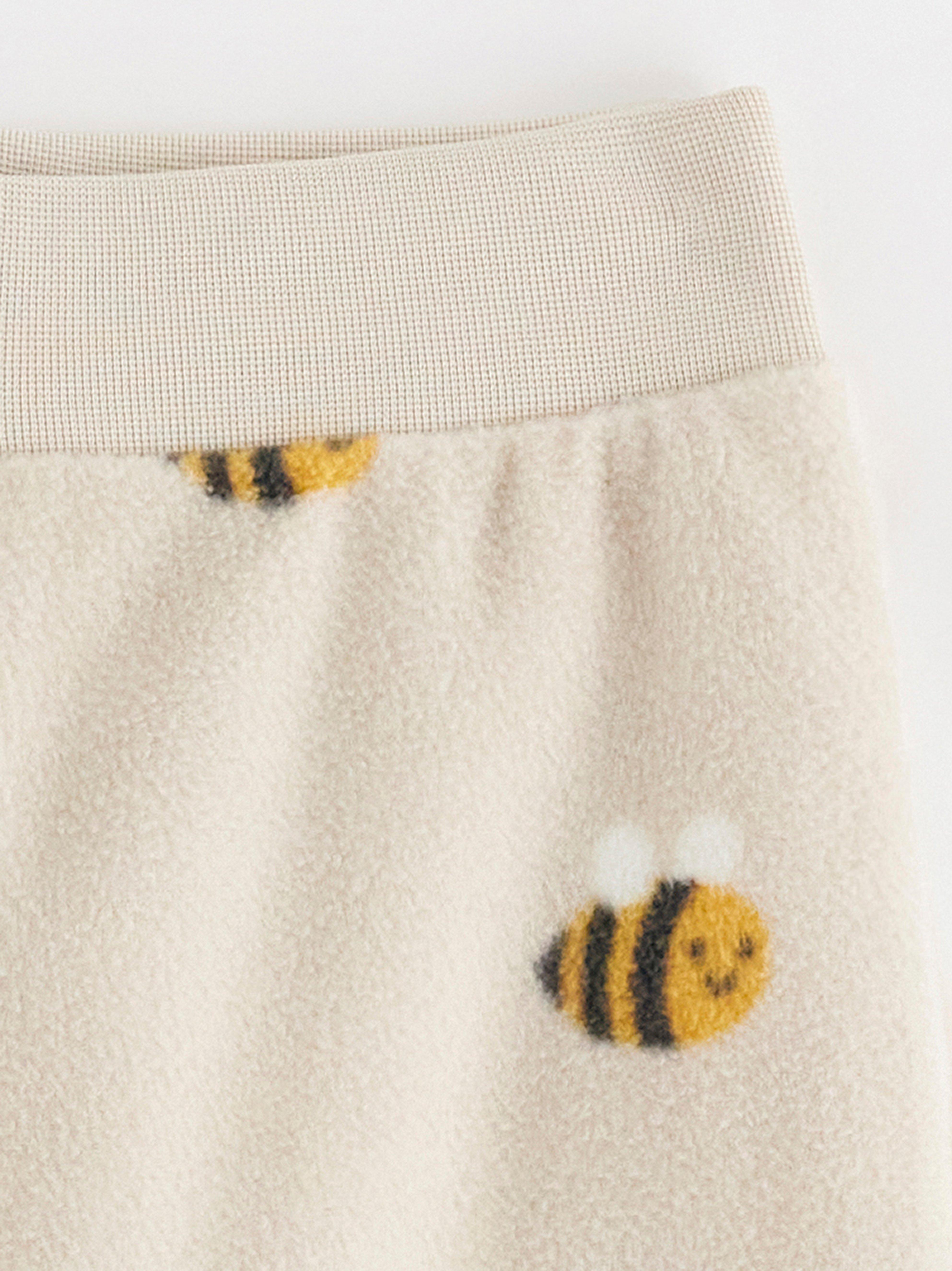 Pantalones deportivos de felpa color beige claro