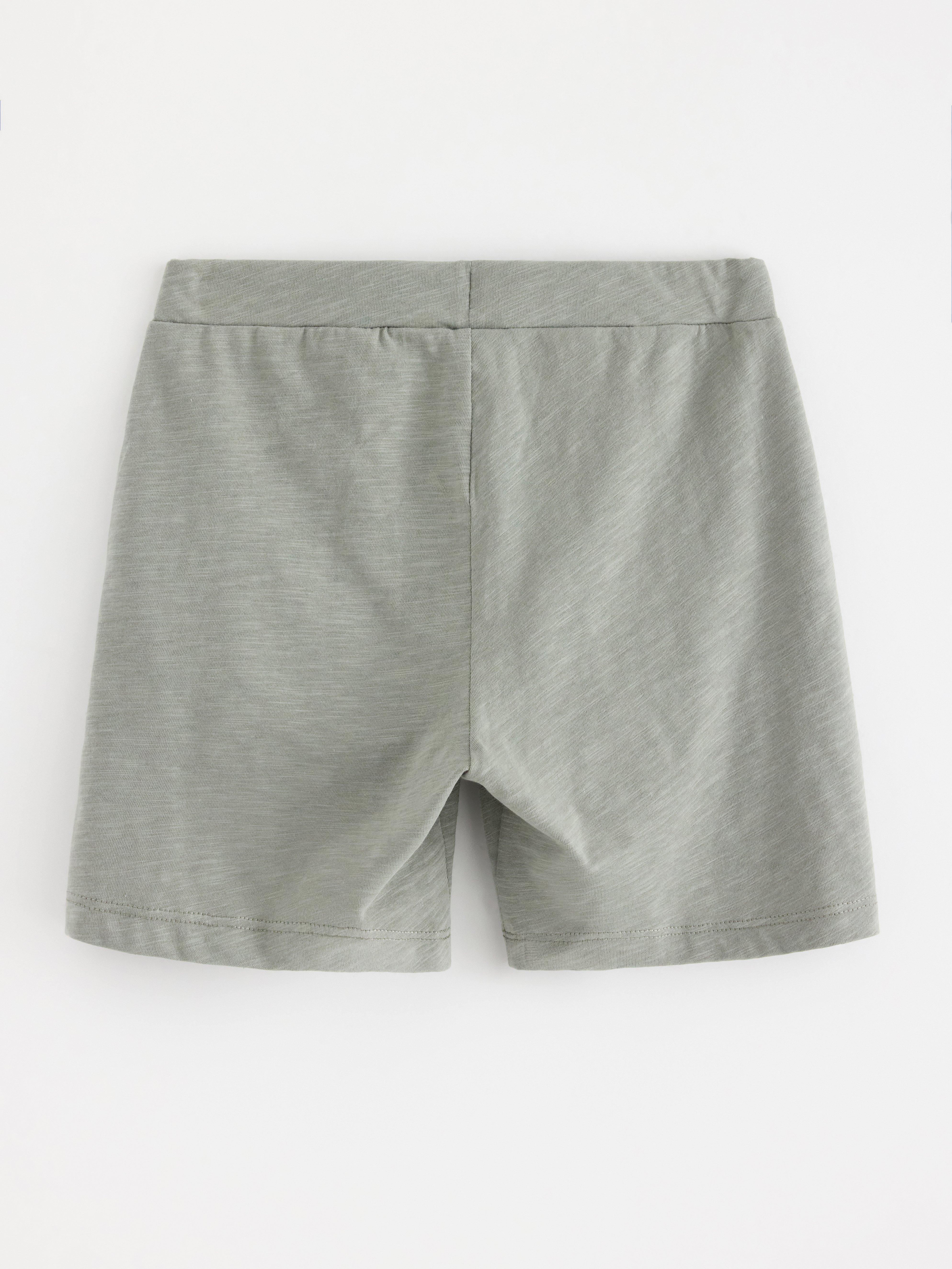 Short en maille flammée vert poussiéreux