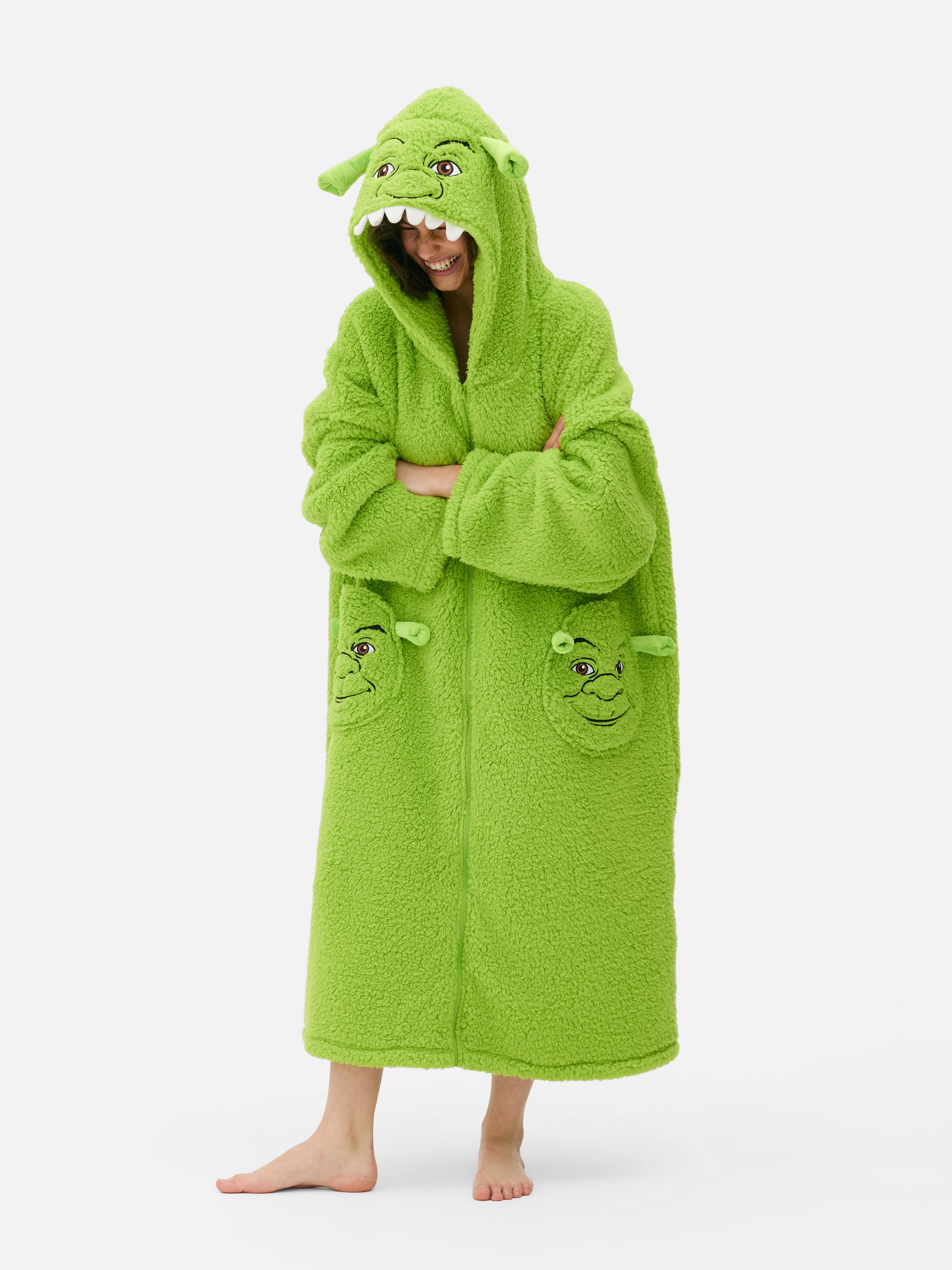 Hosszú női Shrek mintás snuddie. Hosszú Shrek snuddie tágas kapucnival, elülső cipzárral és foltzsebekkel.