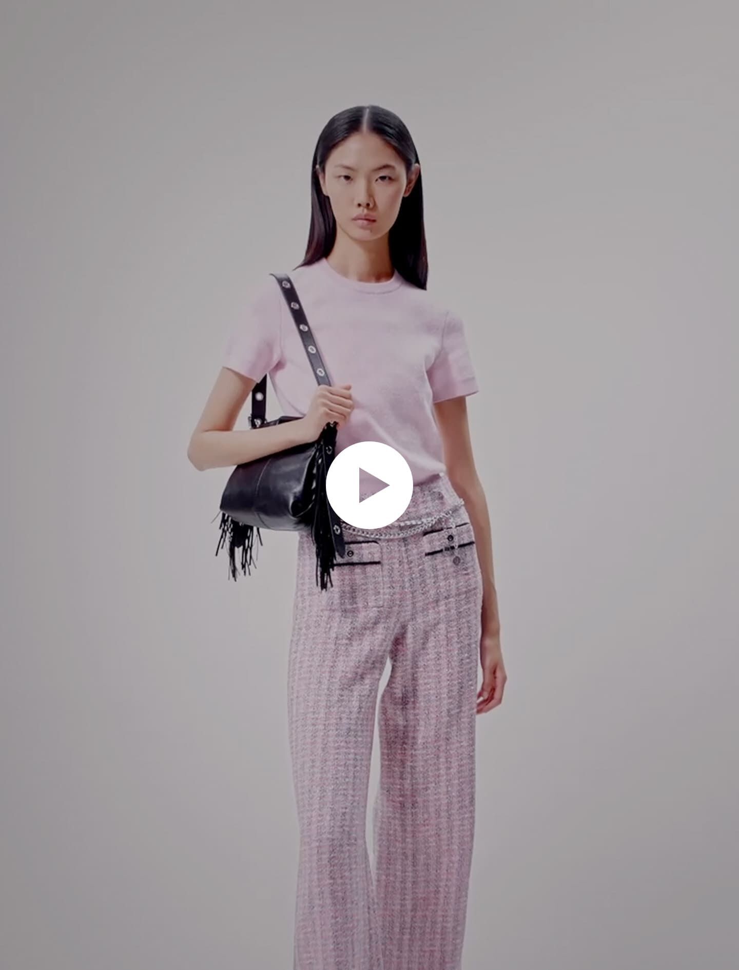 Broek ook verkrijgbaar in tweed-roze/zwart