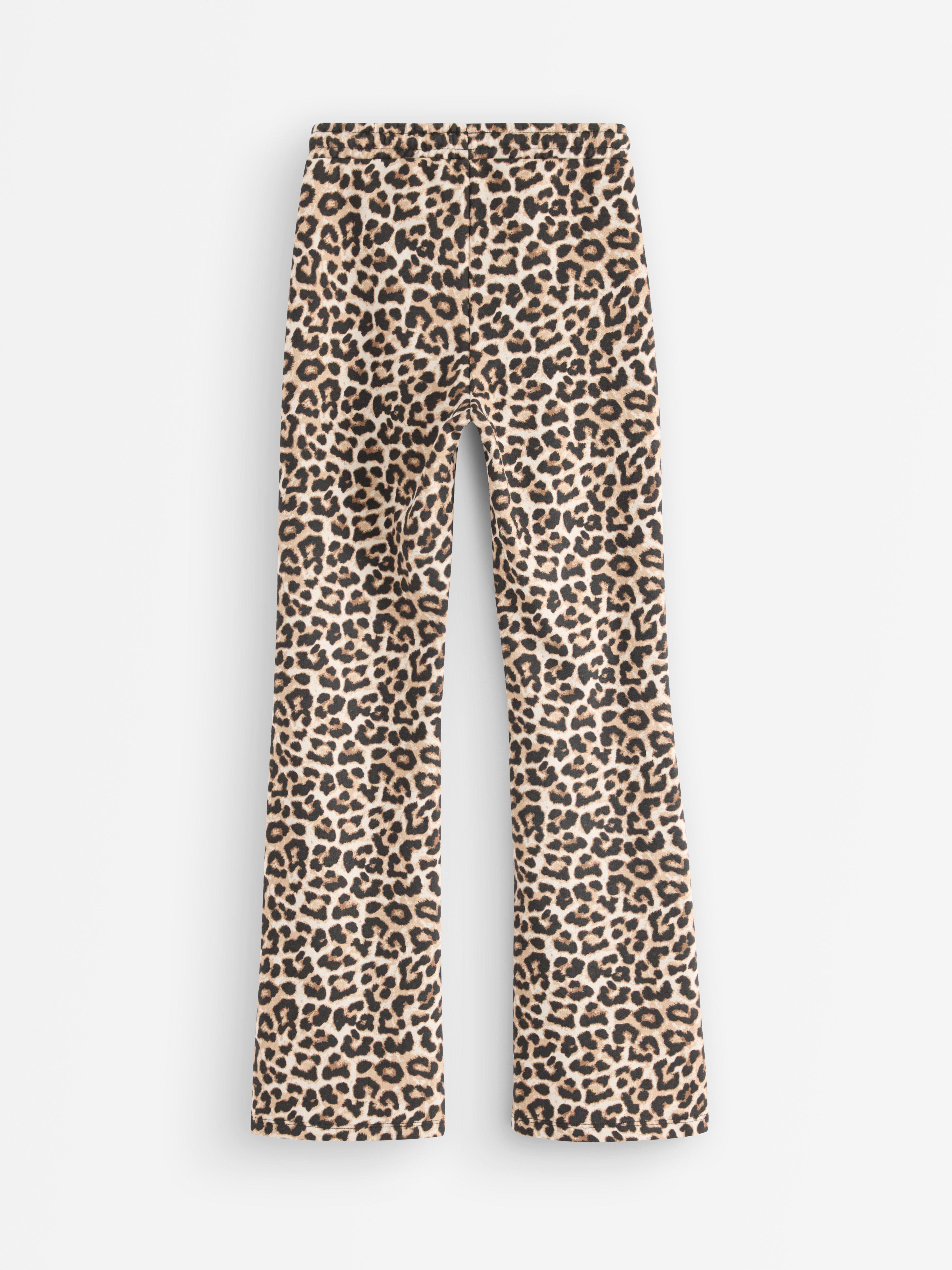 Calça de moletom boca de sino bege