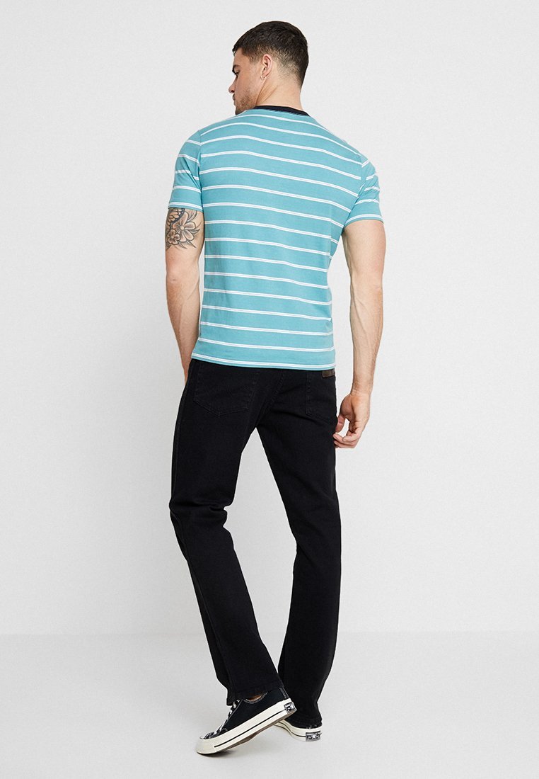 Jean Wrangler TEXAS - coupe droite - surteint noir