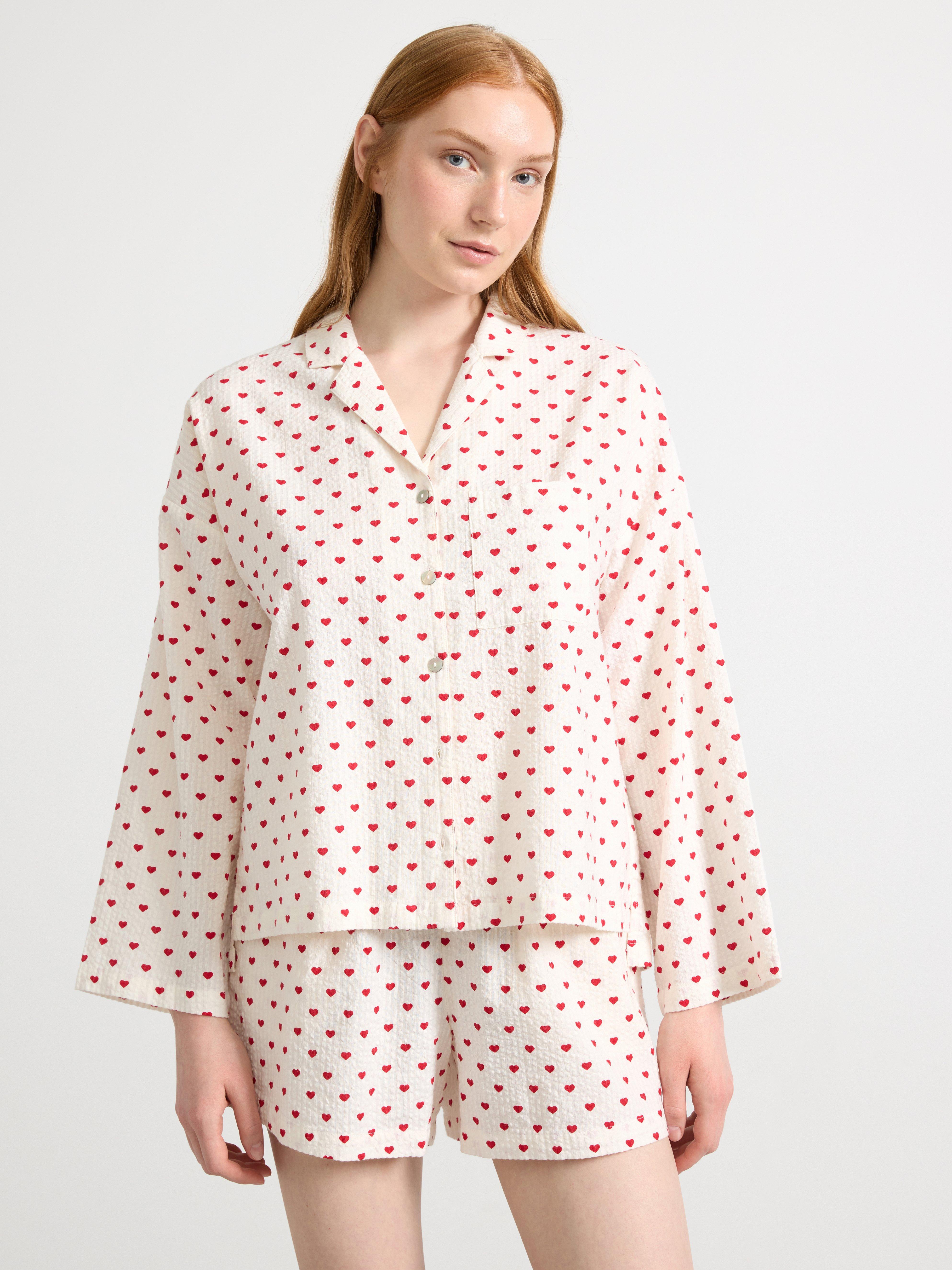 Camisola vermelha com estampa de ondas de riacho