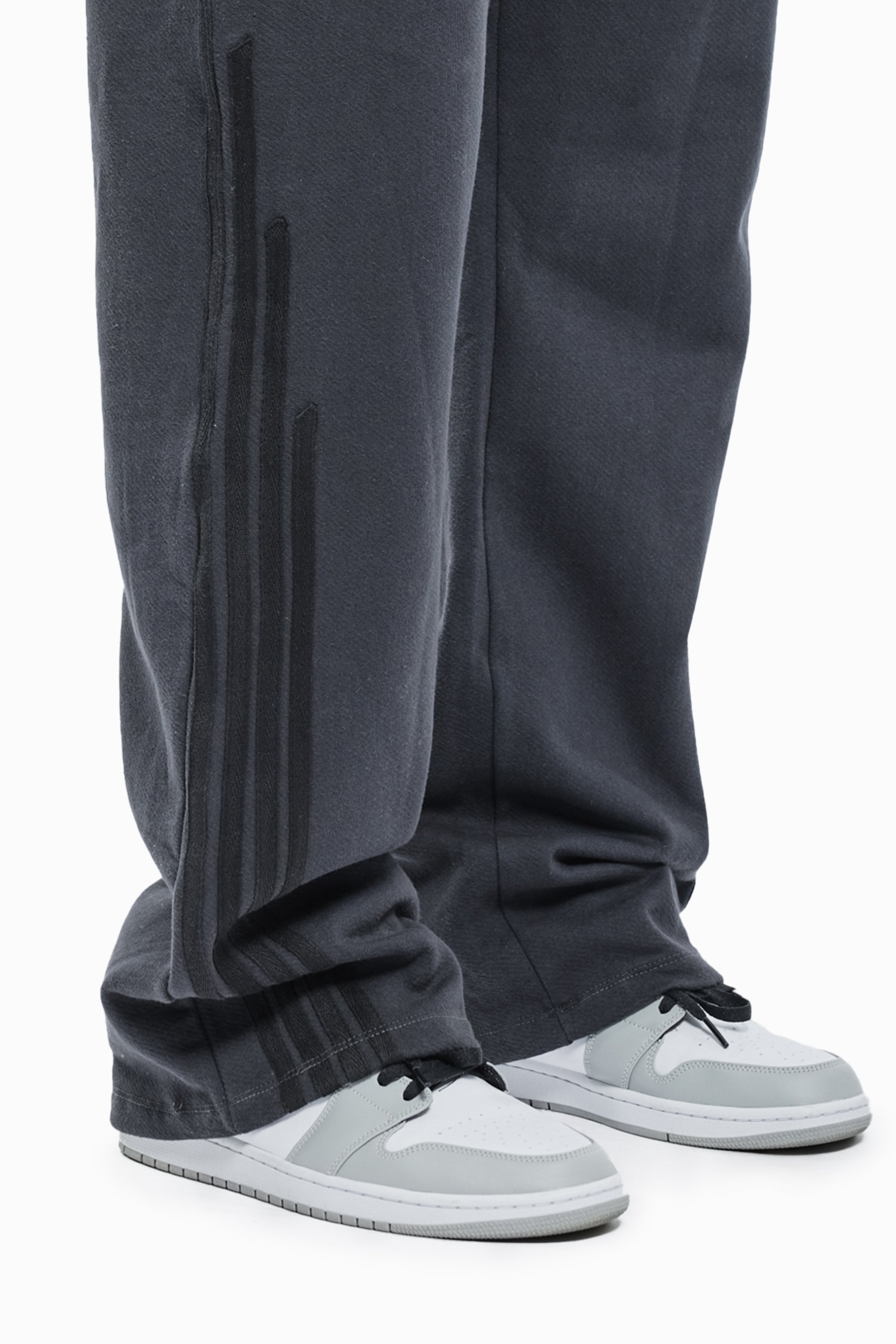 FAVELA TRIIBUD VINTAGE JOGGER UNISEX - Dressipüksid - mustad