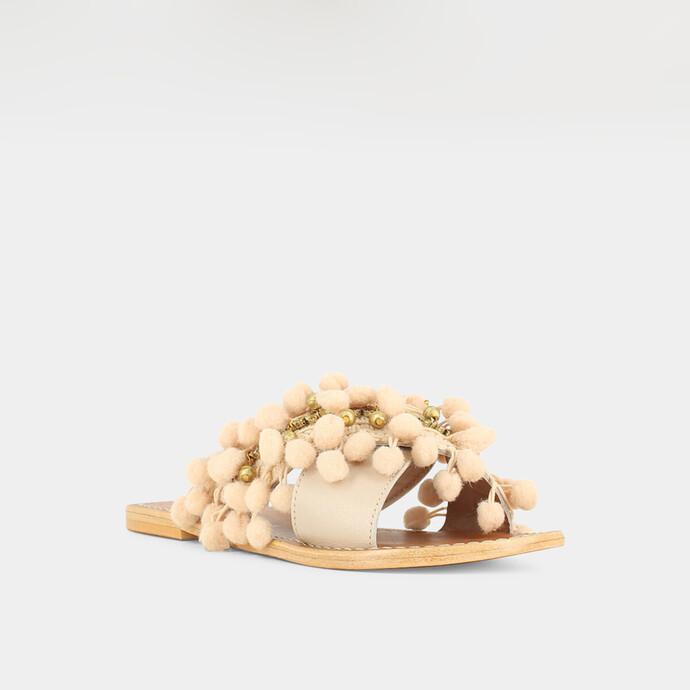 Mules à pompons et perles  en cuir et tissu beige
