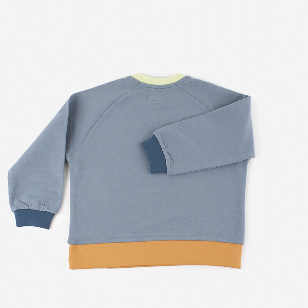 Moletom V. Things Fleece com combinação de cores e forro interno de lã.