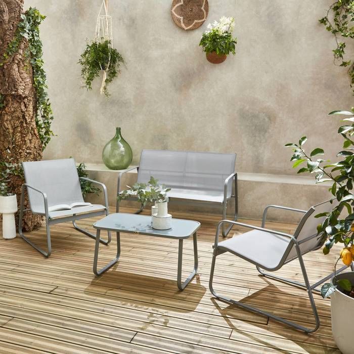 Conjunto de muebles de jardín de metal y textilene para 4 personas. Gris claro. Diseño