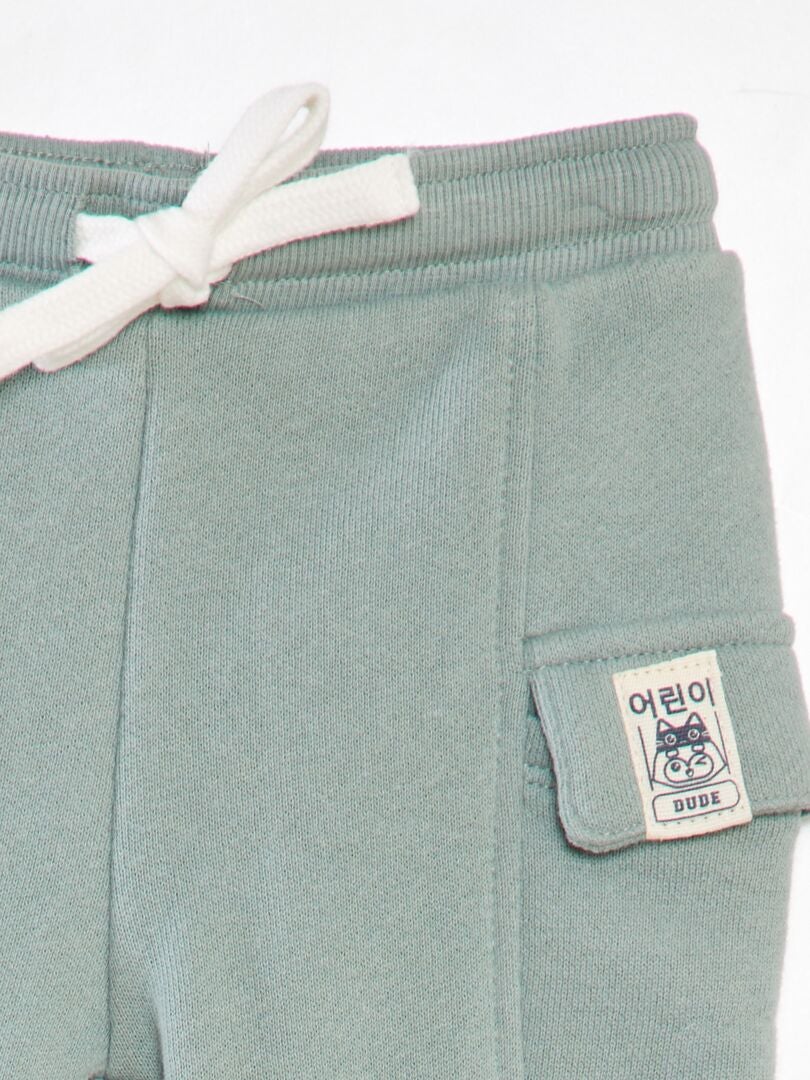 Joggingbroek van French terry met klepzakken - GROEN