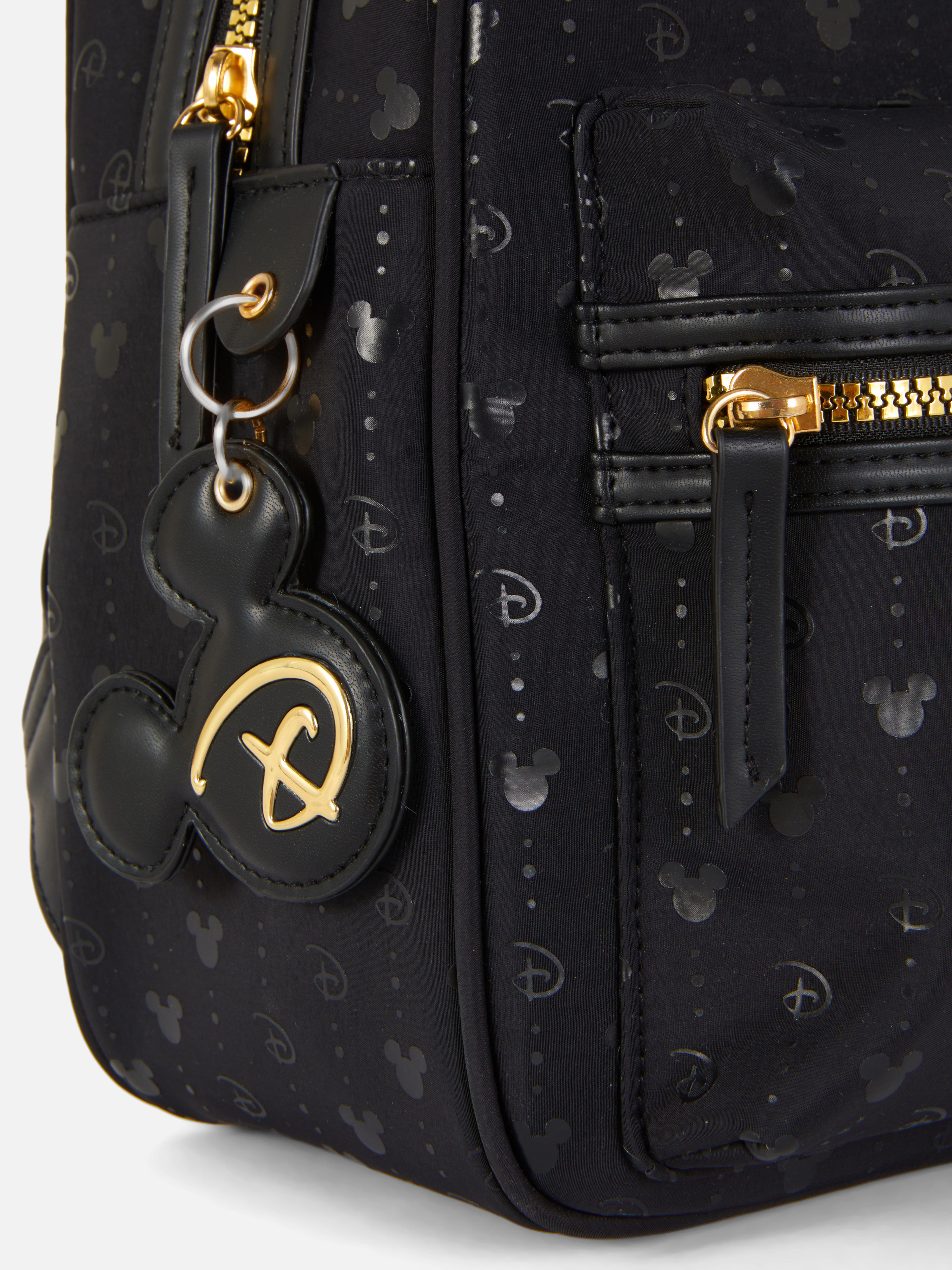 Disneys Mickey Mouse Monogramm-Rucksack Unser Mickey Mouse Rucksack mit goldfarbenen Verzierungen ist ein absolutes Must-have