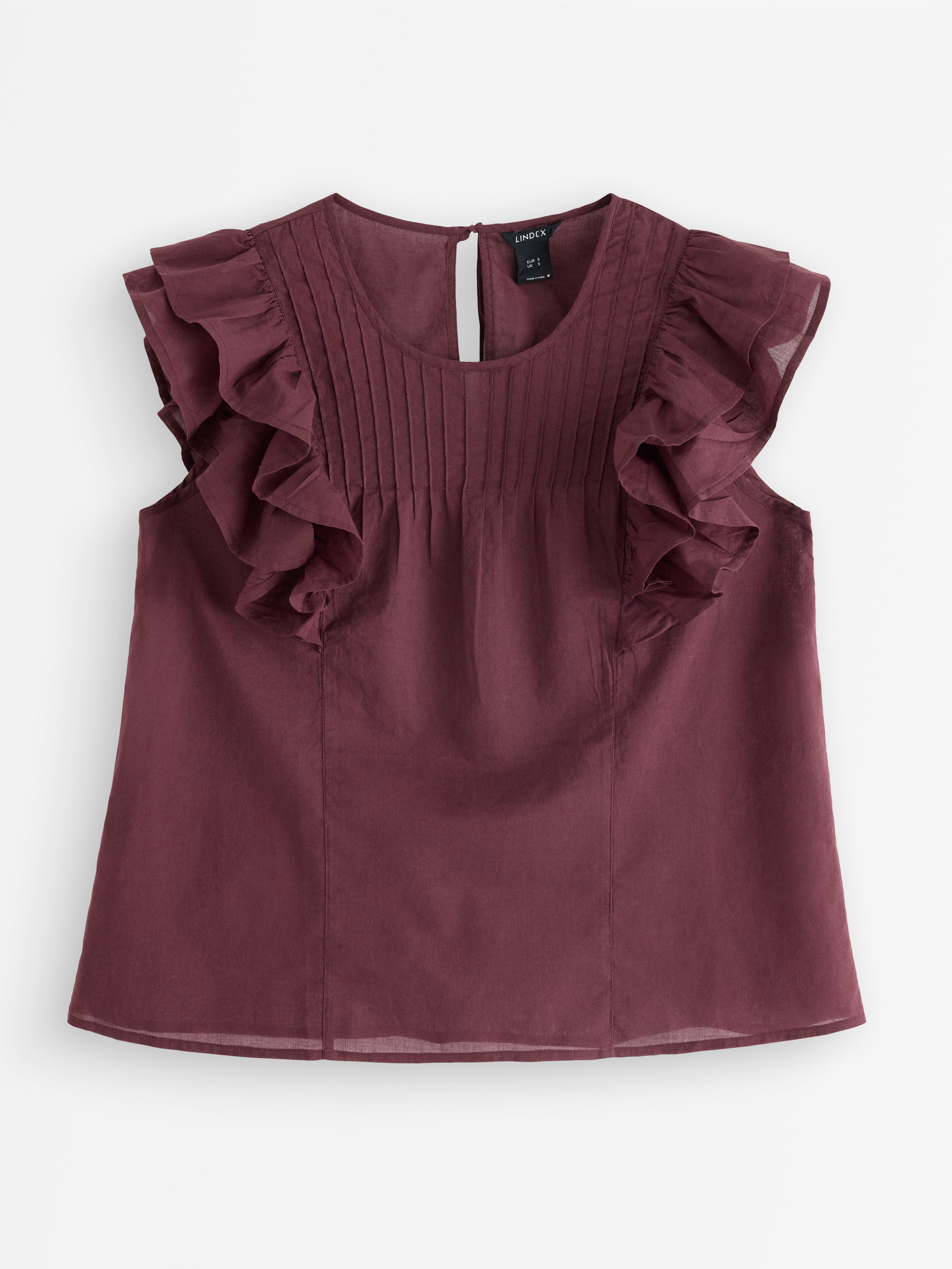 Blusa sin mangas rojo oscuro