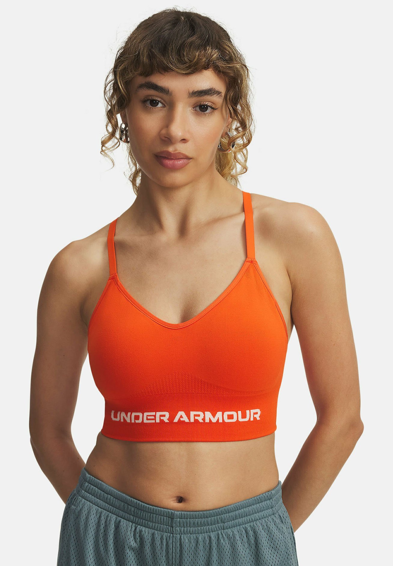 Under Armour VANISH SEAMLESS LOW - Sportbeha met lichte ondersteuning - oranje basis