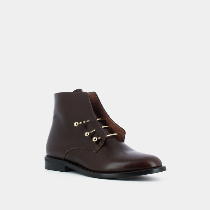 Boots à barres métallisées  en cuir cognac