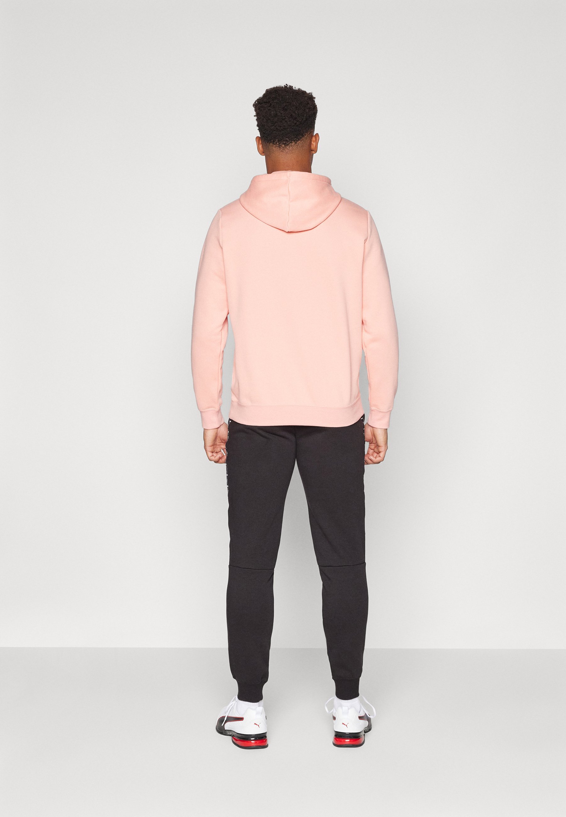 Puma TAPE SWEATPANTS - Trainingsbroek - zwart