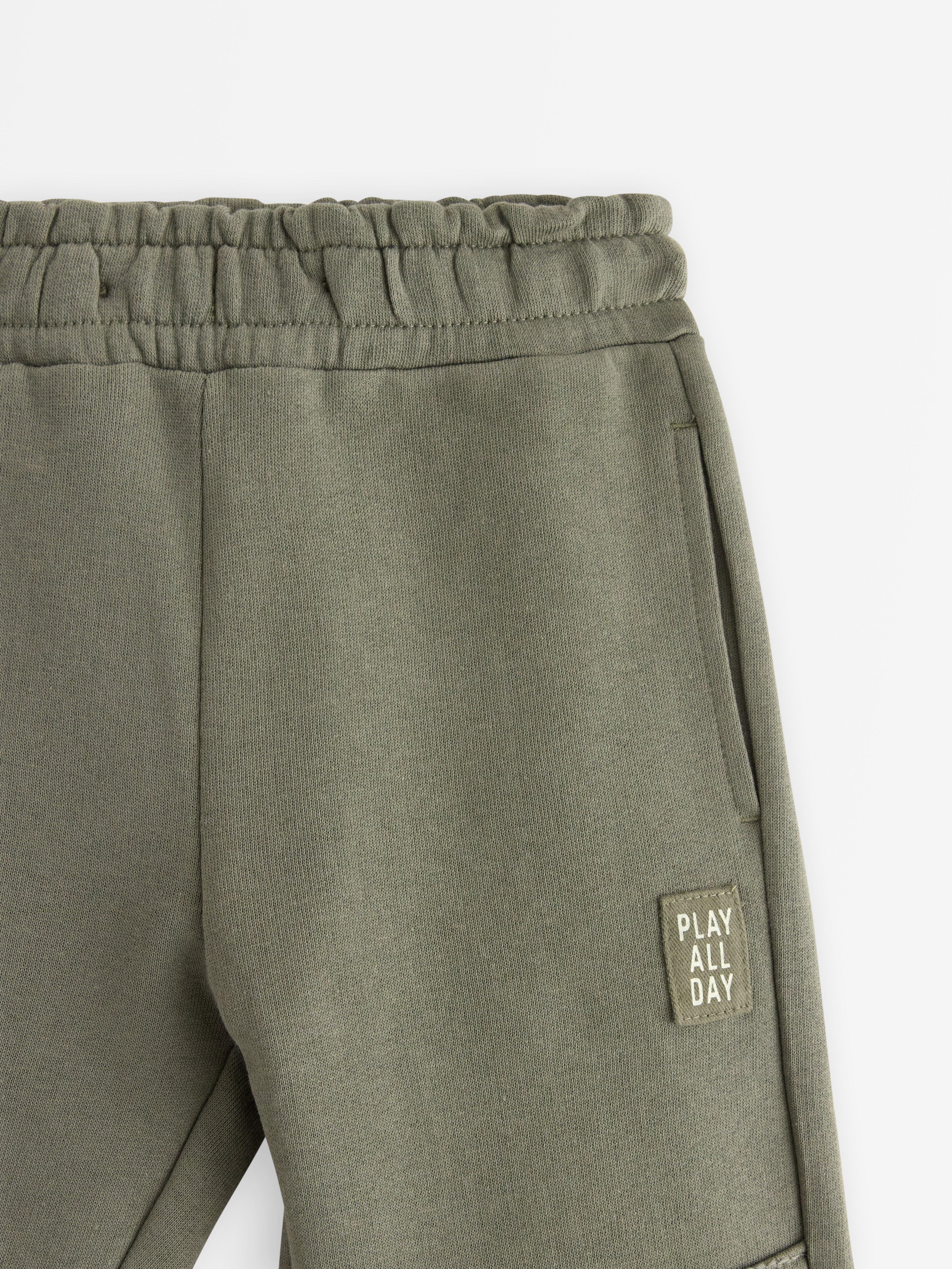 Pantalones deportivos con rodillas reforzadas