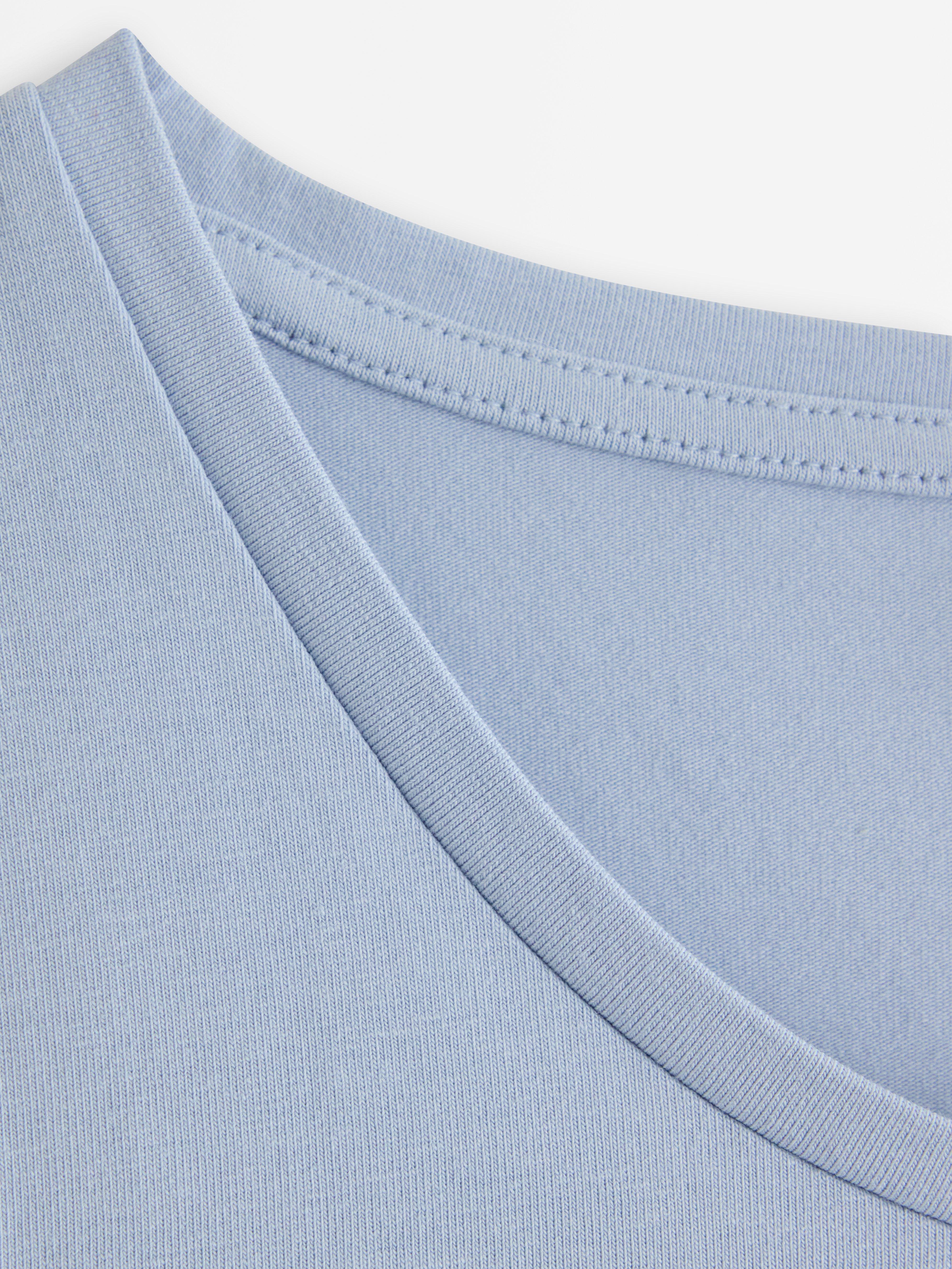 Top con mangas cortas azul claro