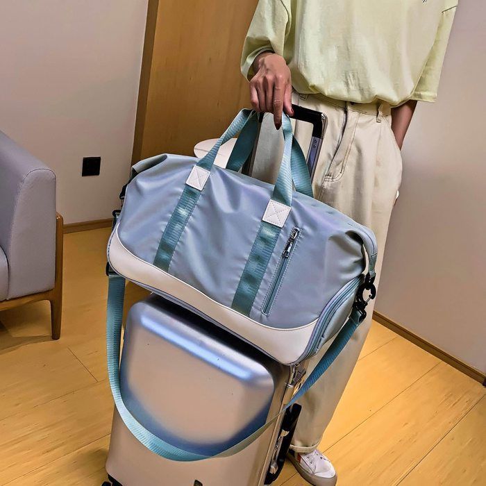 Bolsa deportiva para hombre/mujer, bolsa de viaje con compartimento para zapatos y bolsillo impermeable, bolsa de gimnasio de gran capacidad (40 litros), color azul.
