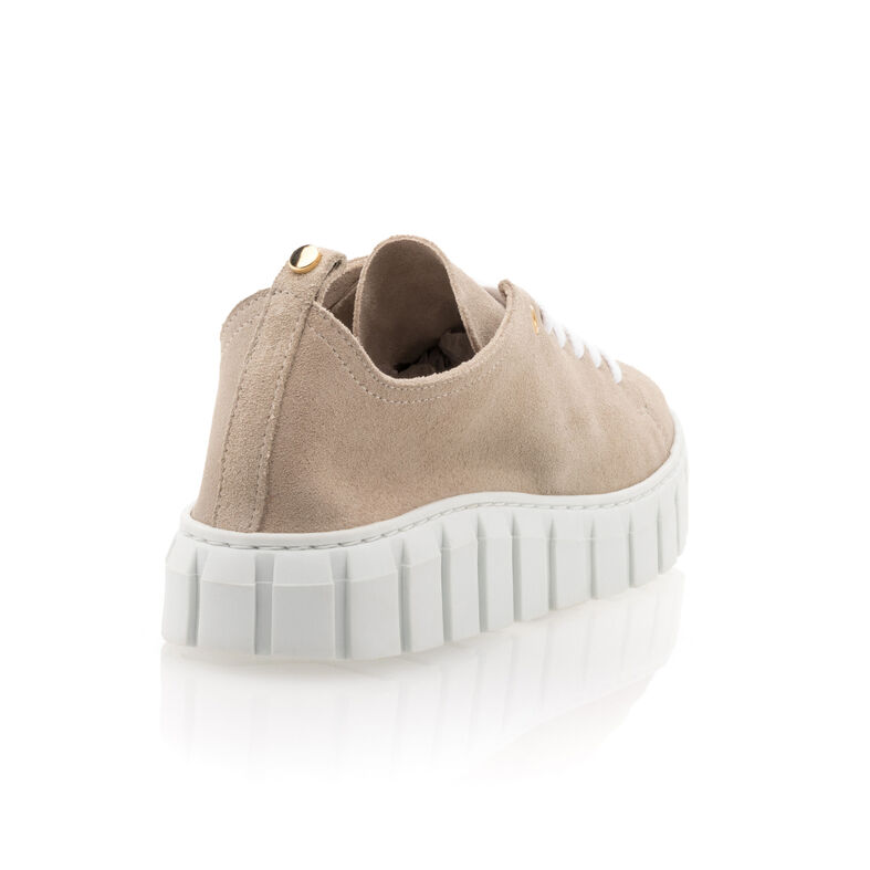 Zapatillas deportivas para mujer color beige.