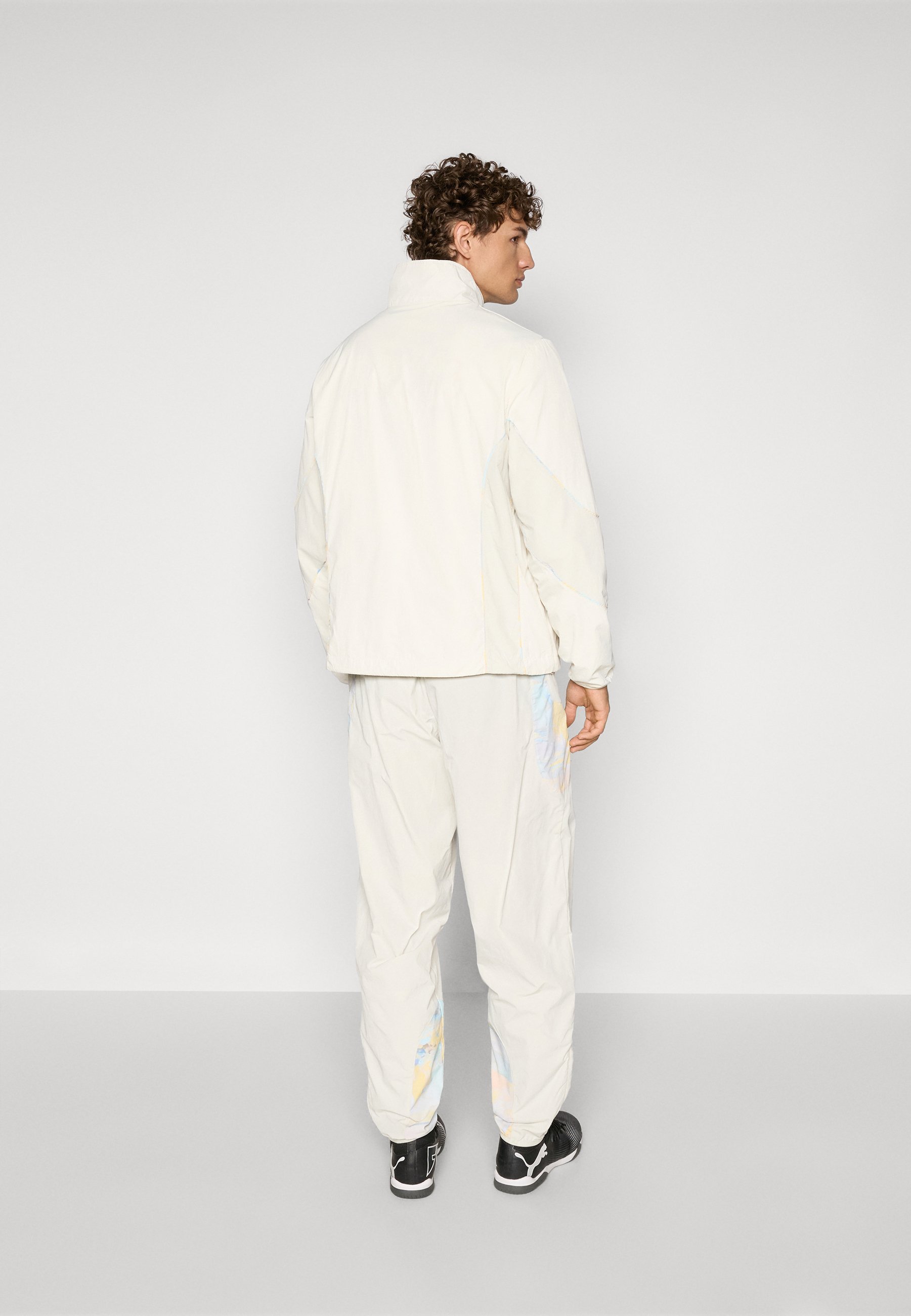 Pantaloni da viaggio Puma KIDSUPER RBS - Abbigliamento da club - blu elettrico/avorio satinato