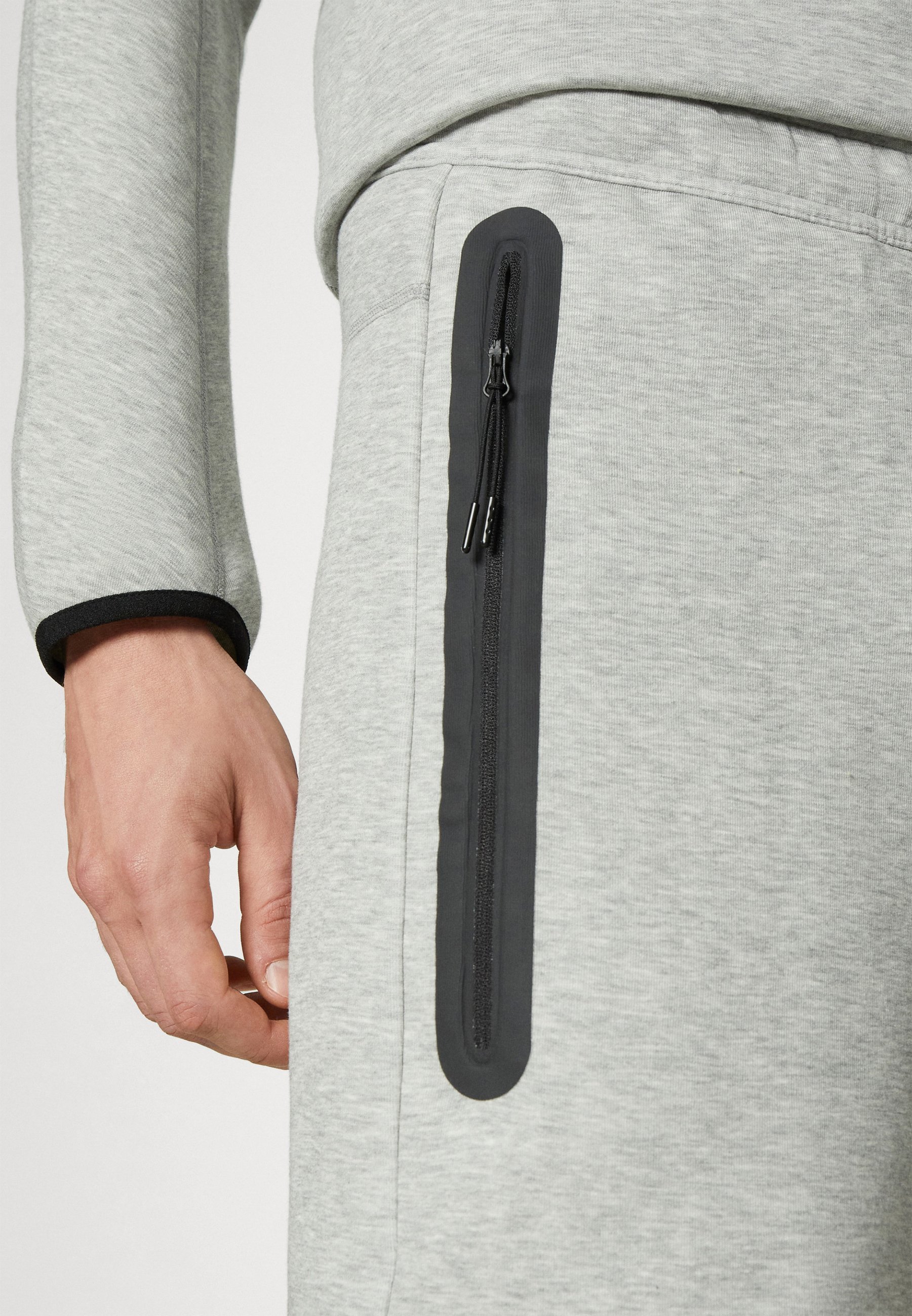 Pantalon de survêtement Nike Sportswear SPORTSWEAR TECH FLEECE - Gris chiné