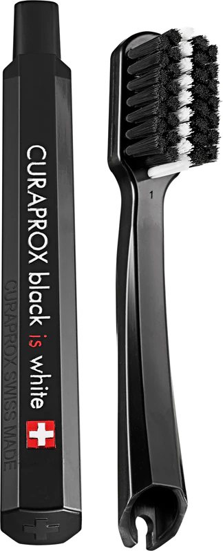 Kit de viagem Curaprox Black is White para dentes, língua e gengivas.