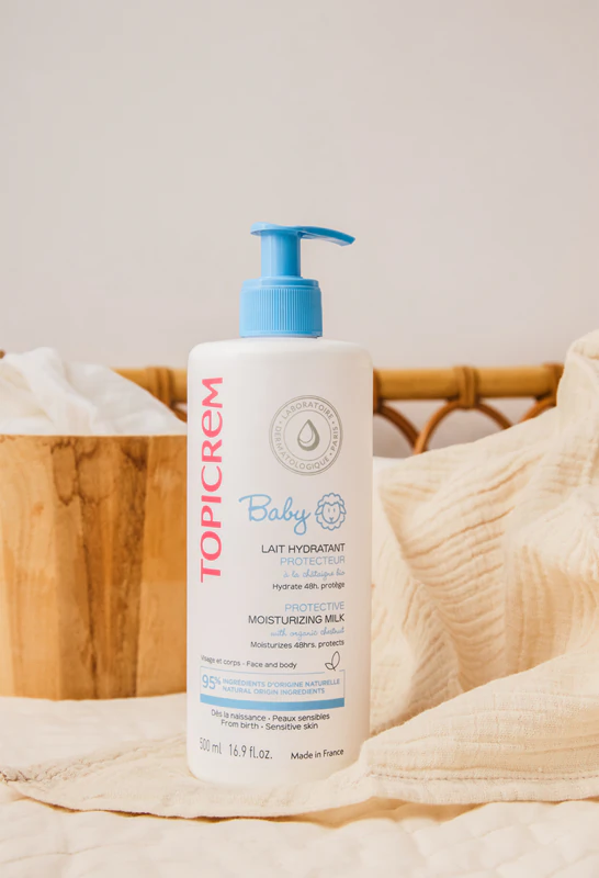 Topicrem BABY Meu Primeiro Leite Ultra-Hidratante, leite hidratante para rosto e corpo para pele seca e sensível.