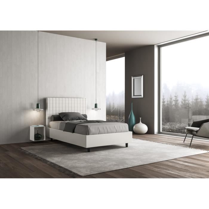 Gestoffeerd bed Sunda van 120x190 cm in wit geruit kunstleer. Zonder lattenbodem of opbergvak.
