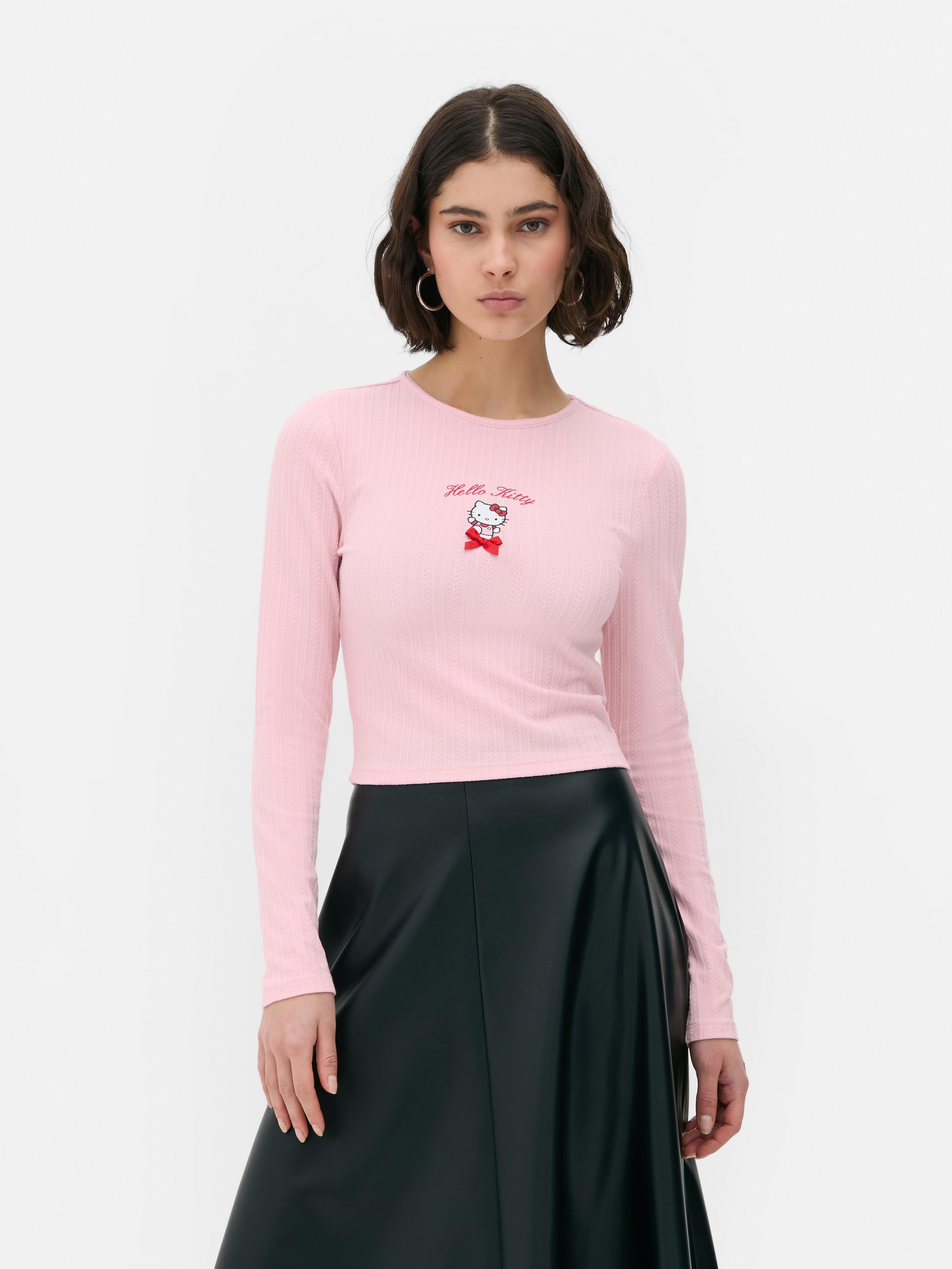 Tricou cu mânecă lungă și imprimeu Hello Kitty ajurat Un tricou cu imprimeu Hello Kitty, mânecă lungă și ajurat