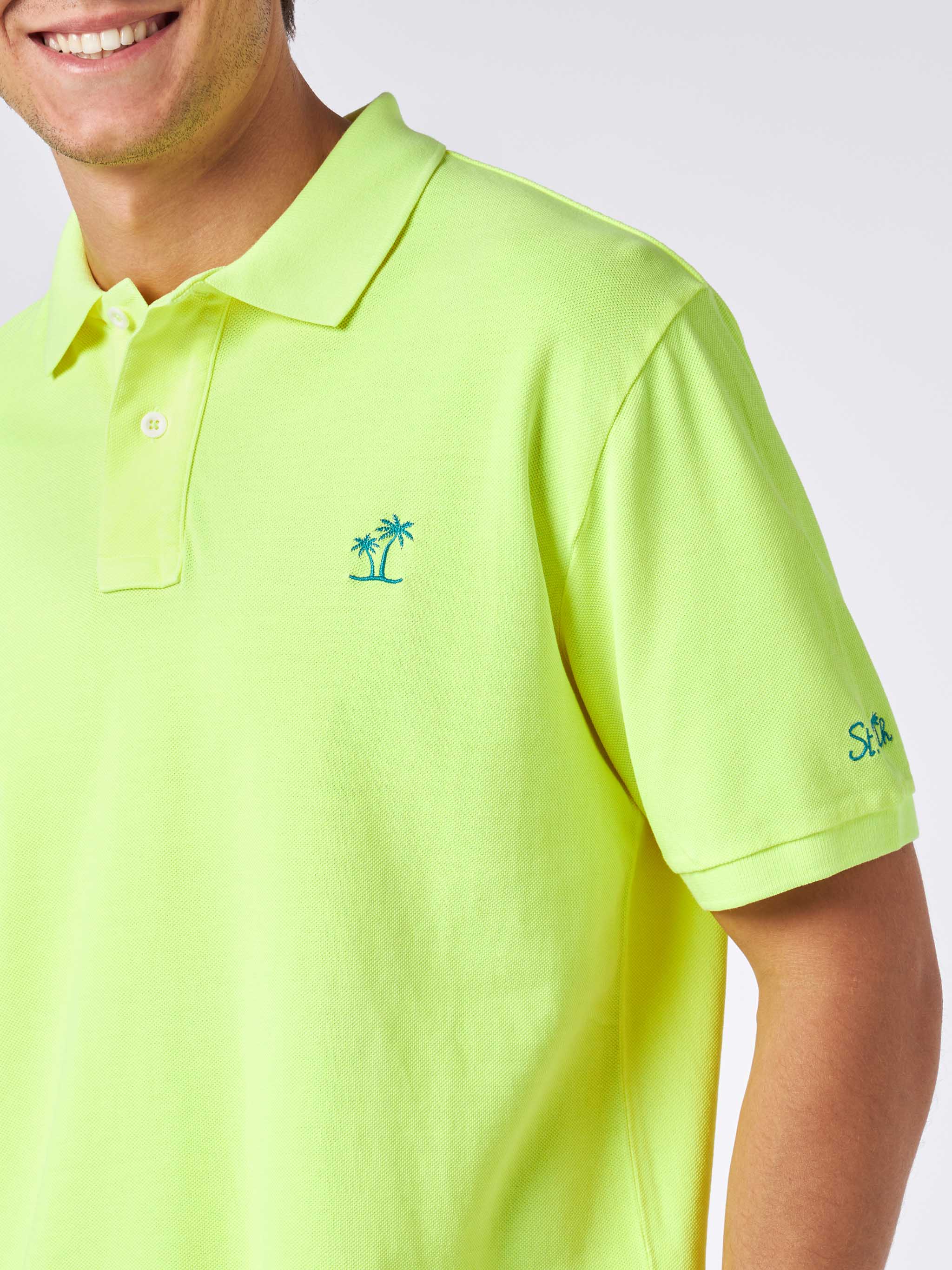 Polo da uomo in piquet giallo fluo con logo St. Barth ed effetto vinta