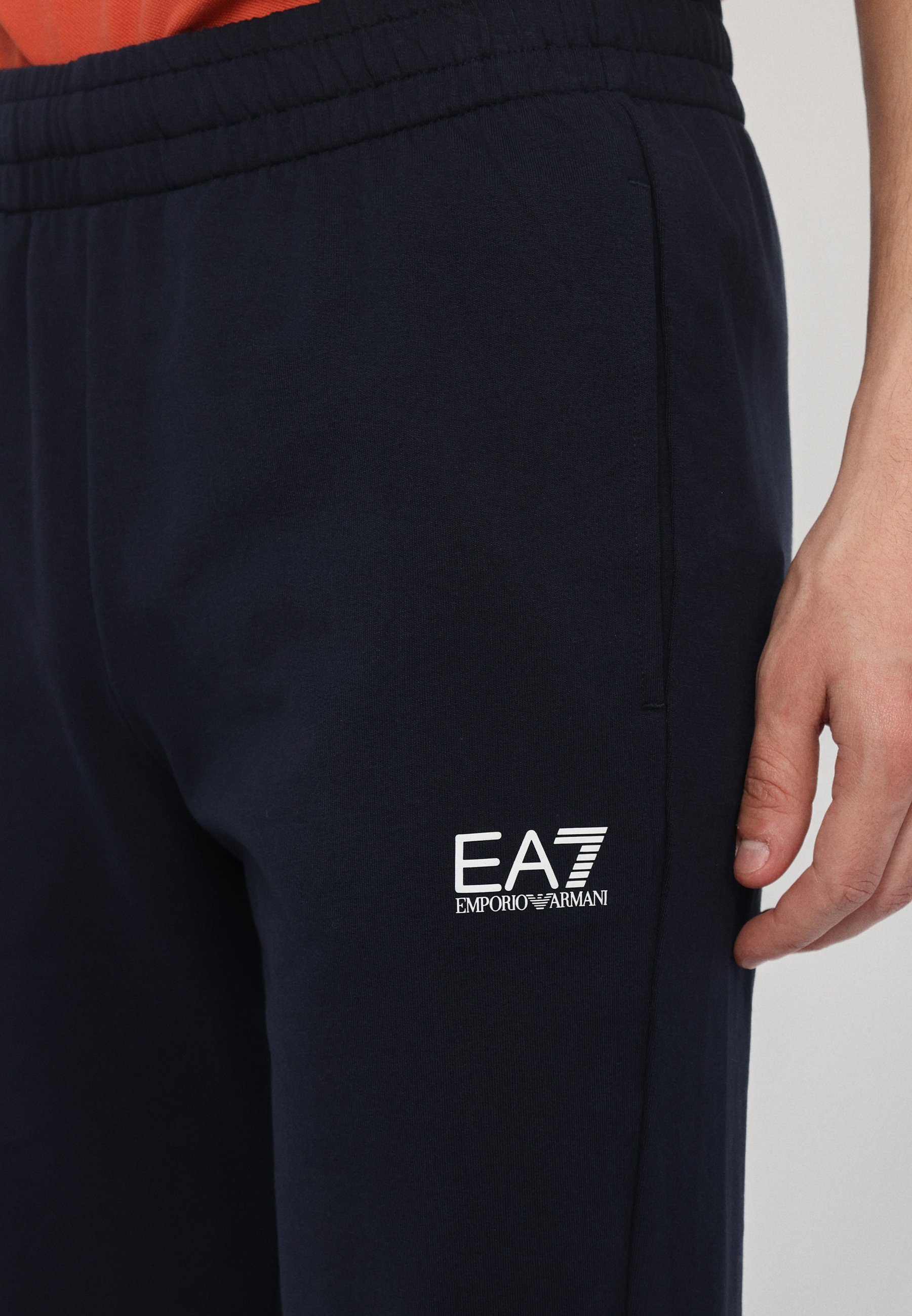 Pantalon de survêtement EA7 Emporio Armani TRAIN CORE - bleu