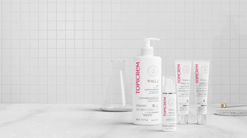 „Topicrem MELA Unifying Ultra-Moisturizing Milk“ drėkinamasis pienelis su SPF15 nuo odos spalvos pakitimų