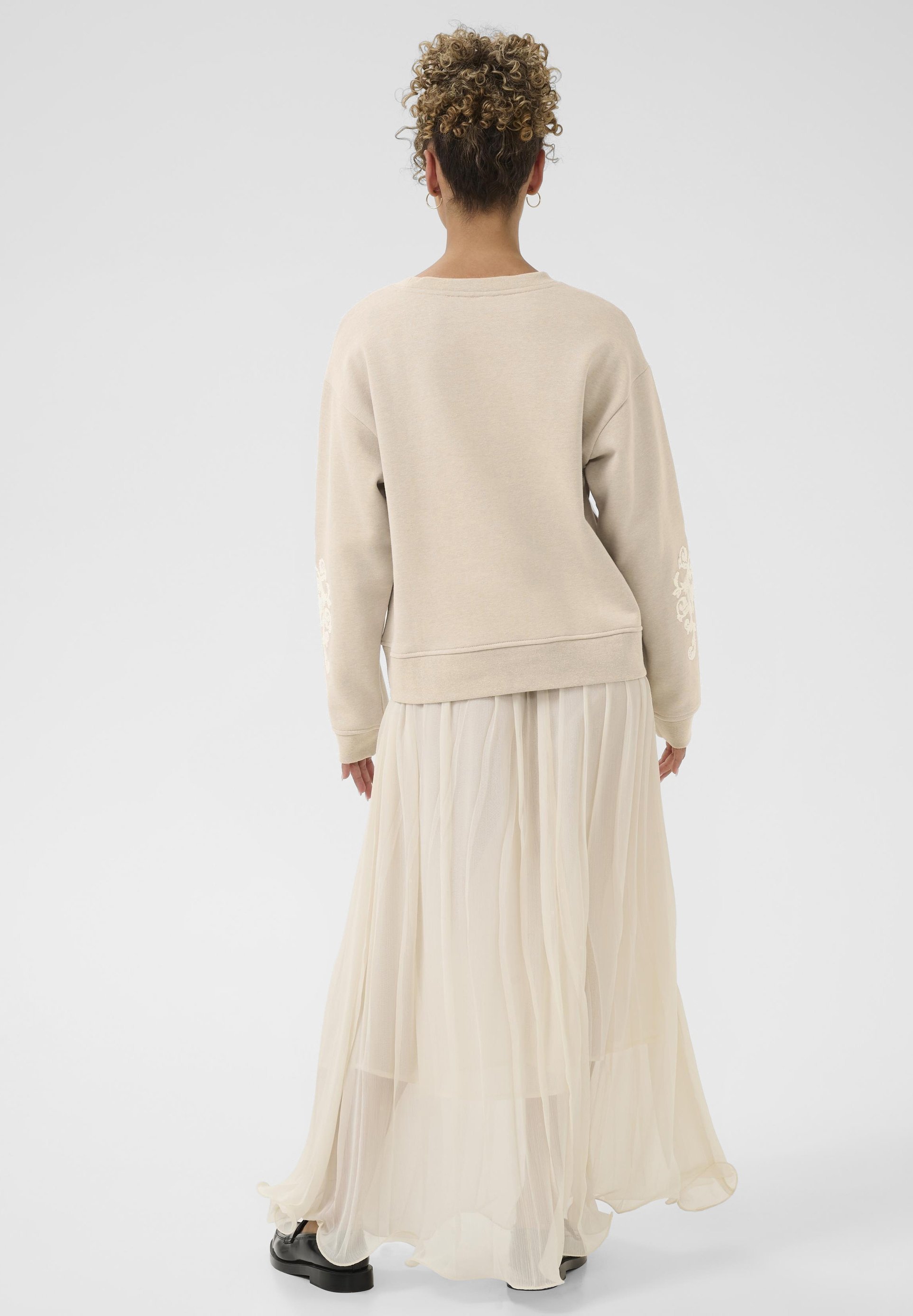 Crèmekleurige sweater - string melange