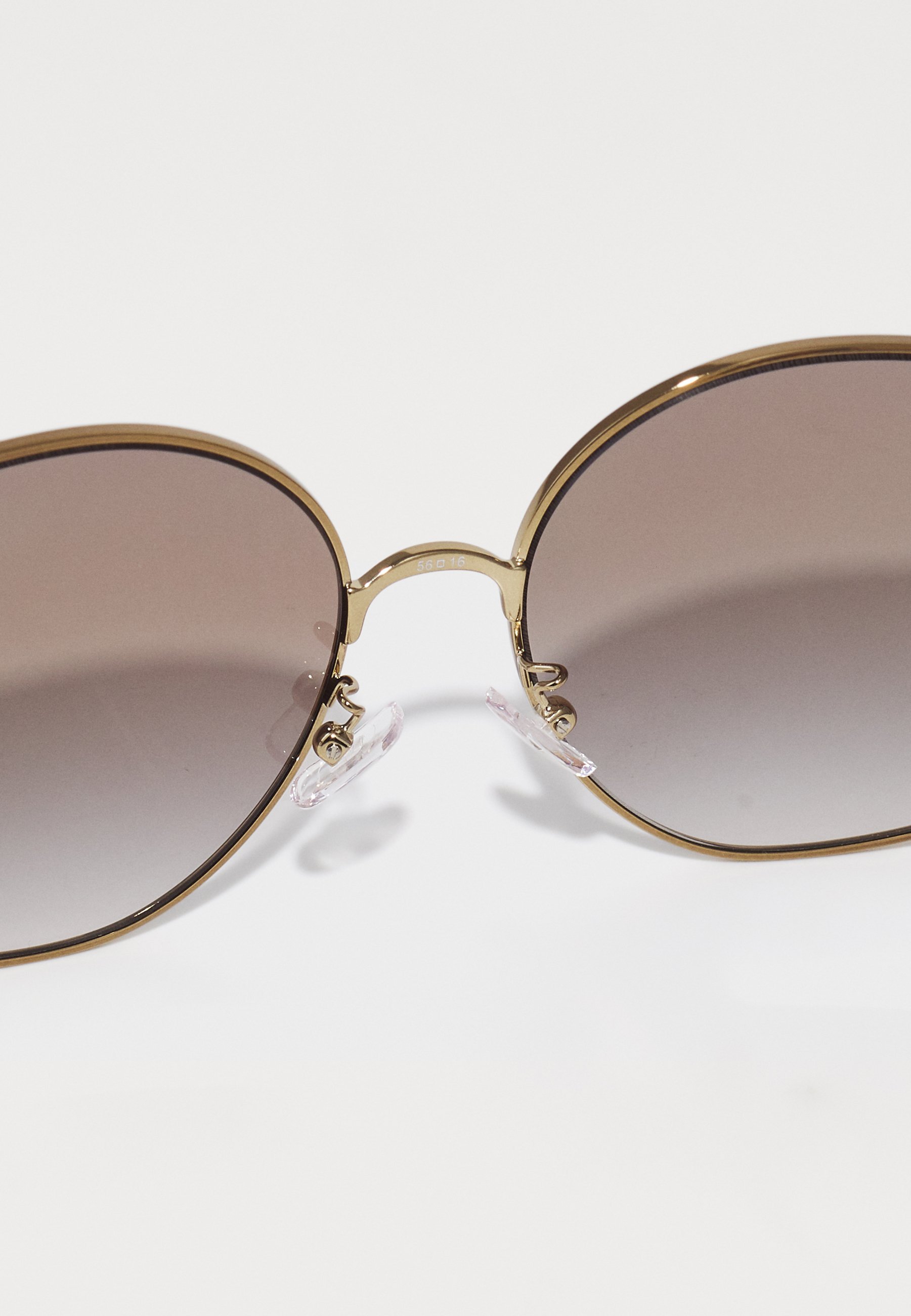 Tory Burch Aurinkolasit - pronssi