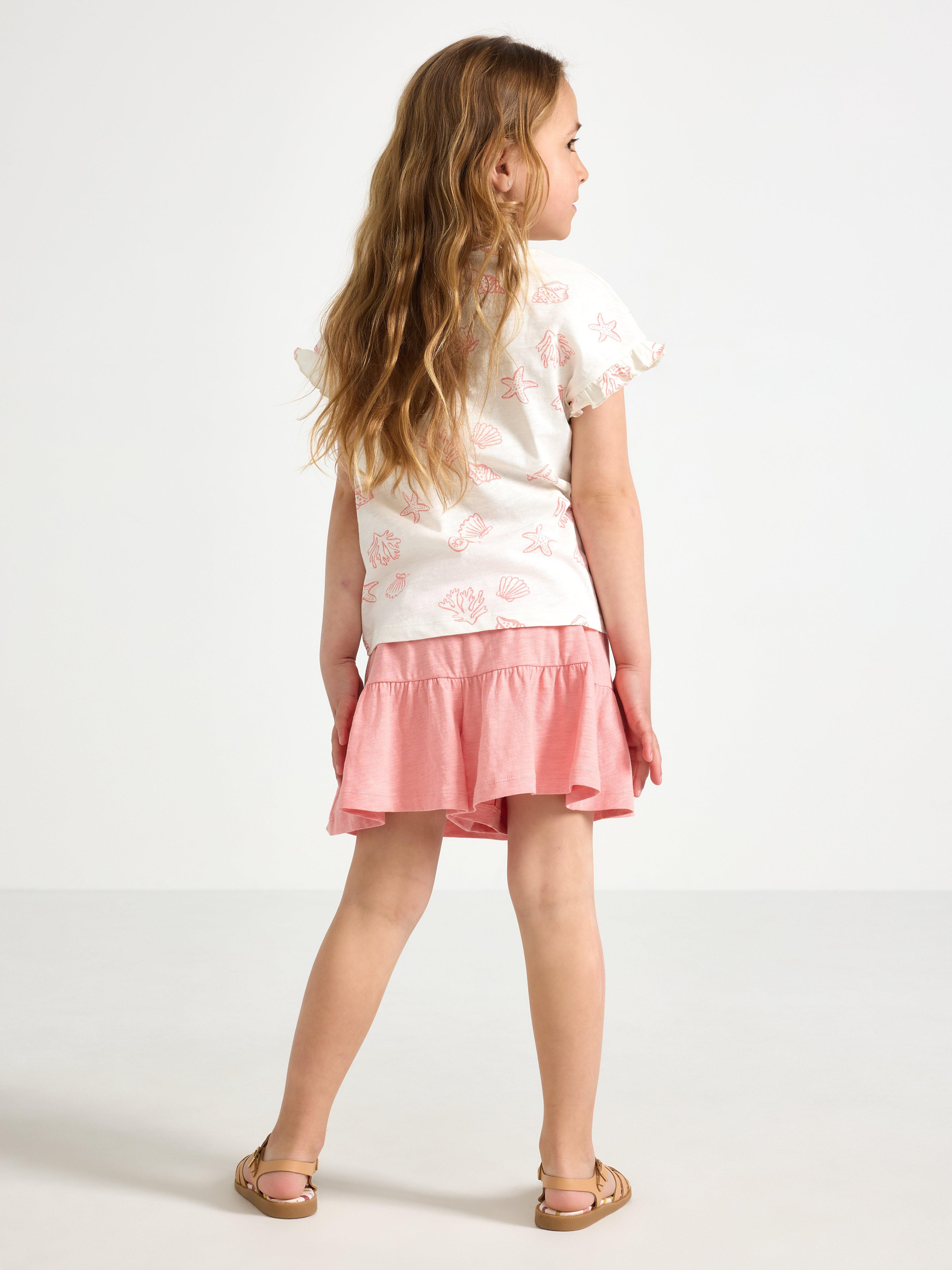 Falda culotte con volantes rosa