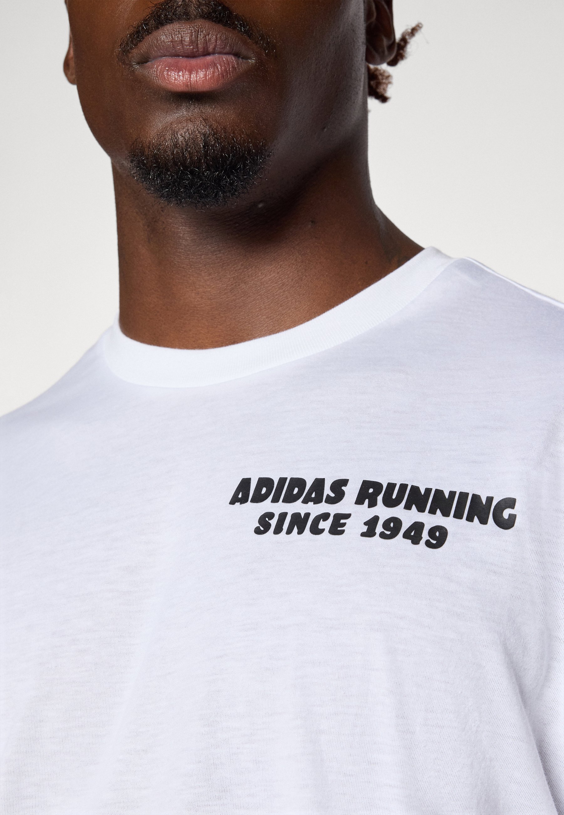 adidas Performance TACO UNISEX - T-shirt met print - wit