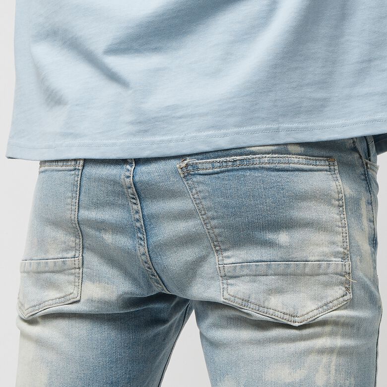 Gebleekt, gewassen, gescheurde en gerepareerde jeans