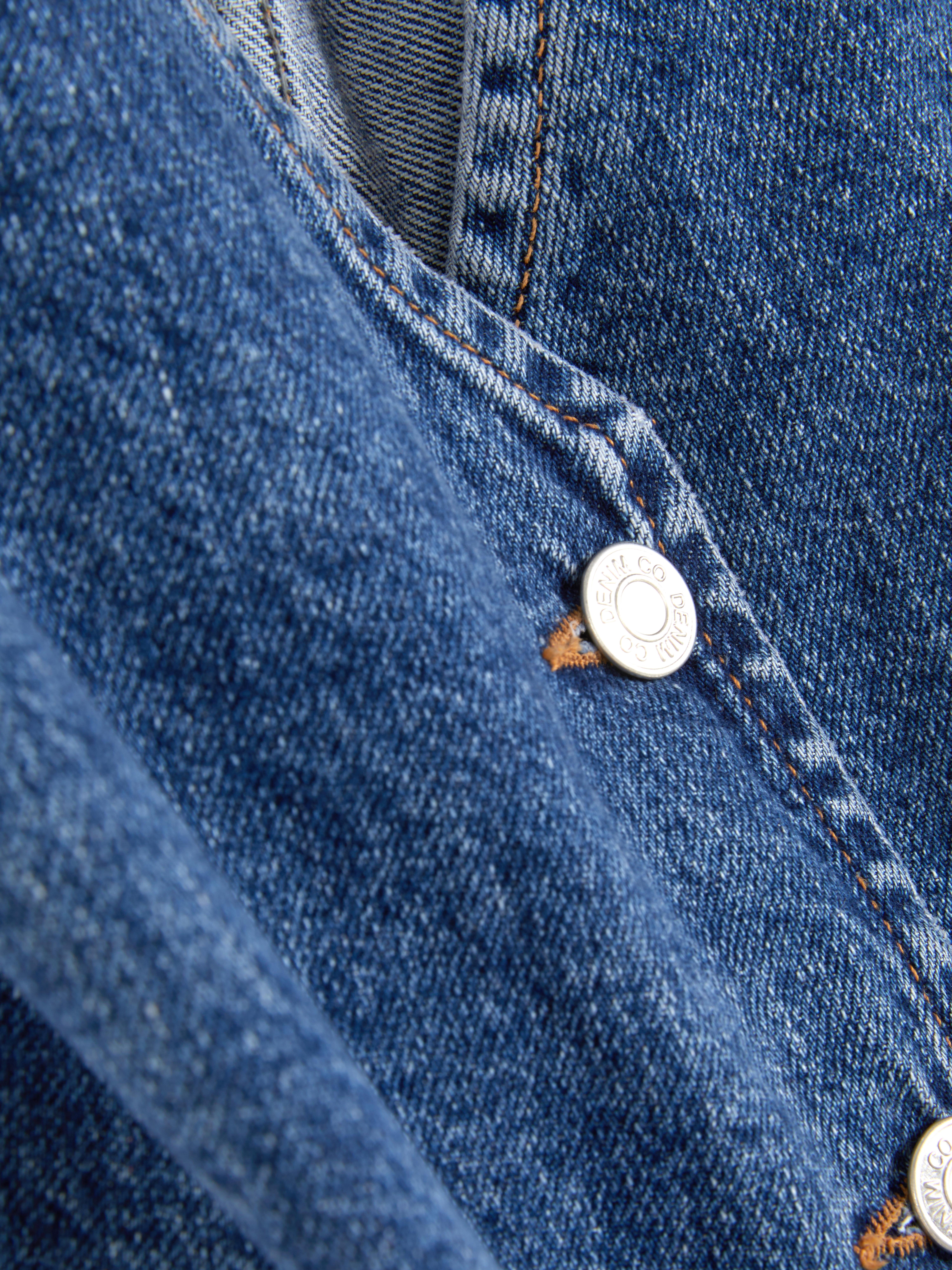 Vestă din denim cu nasturi Vestă din denim cu decolteu în V și închidere cu nasturi în față