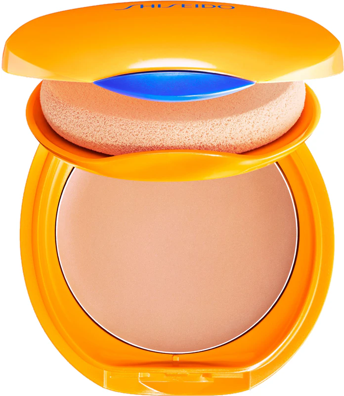 Base compacta autobronzeadora Shiseido Expert Sun Protector FPS 10, à prova d'água e recarregável.