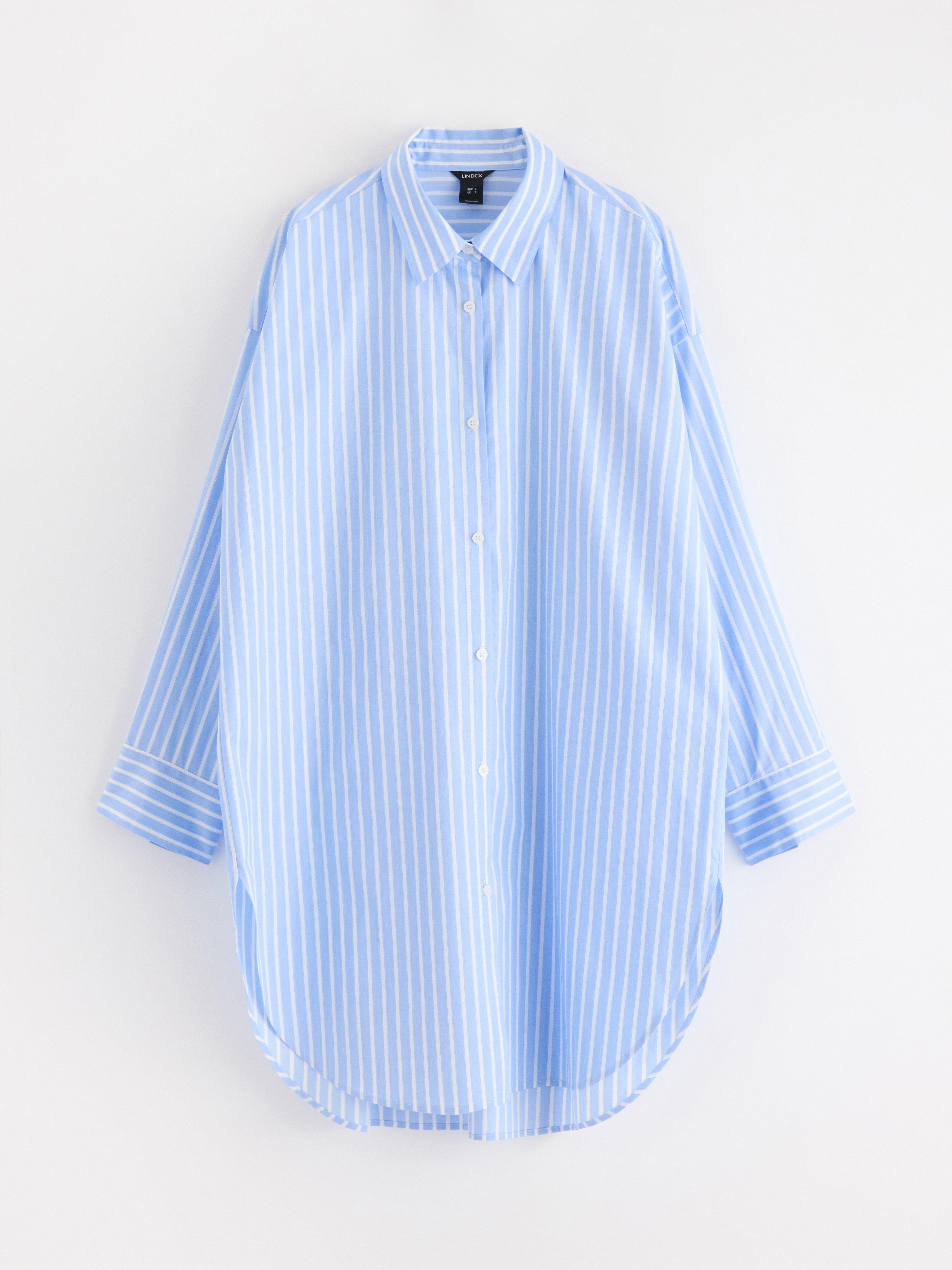 Camisa comprida azul claro